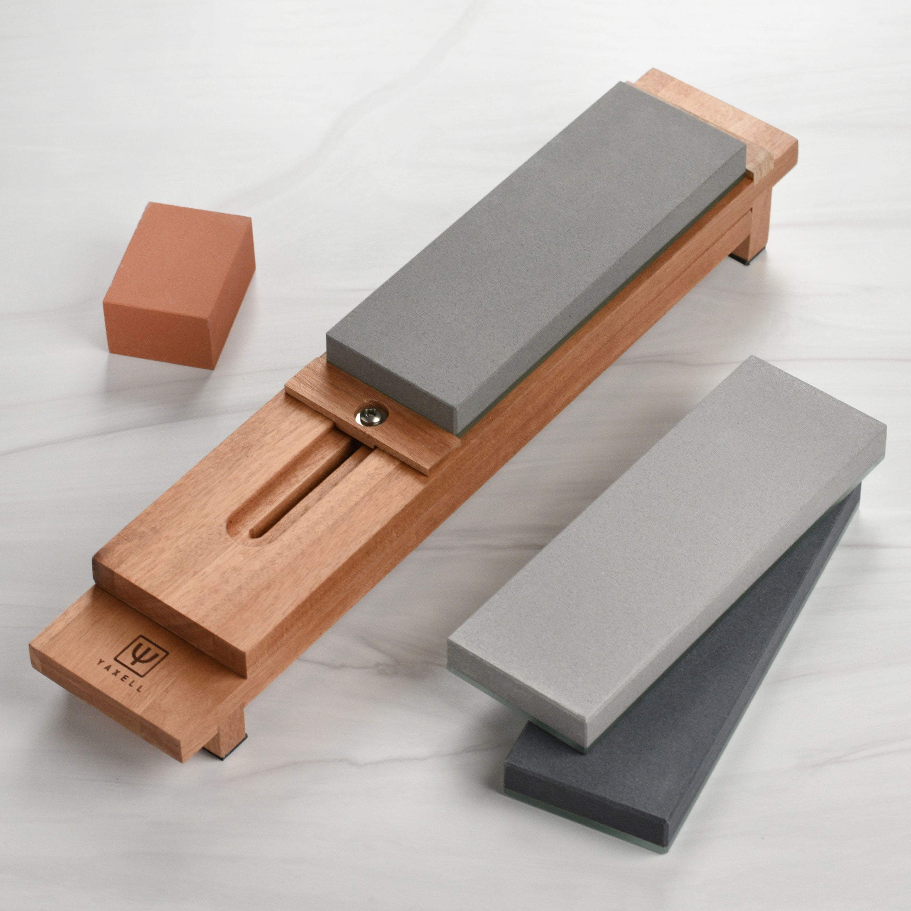 Close-up of Yaxell Pro 5-Piece Water Stone Sharpening Set showing grit levels.