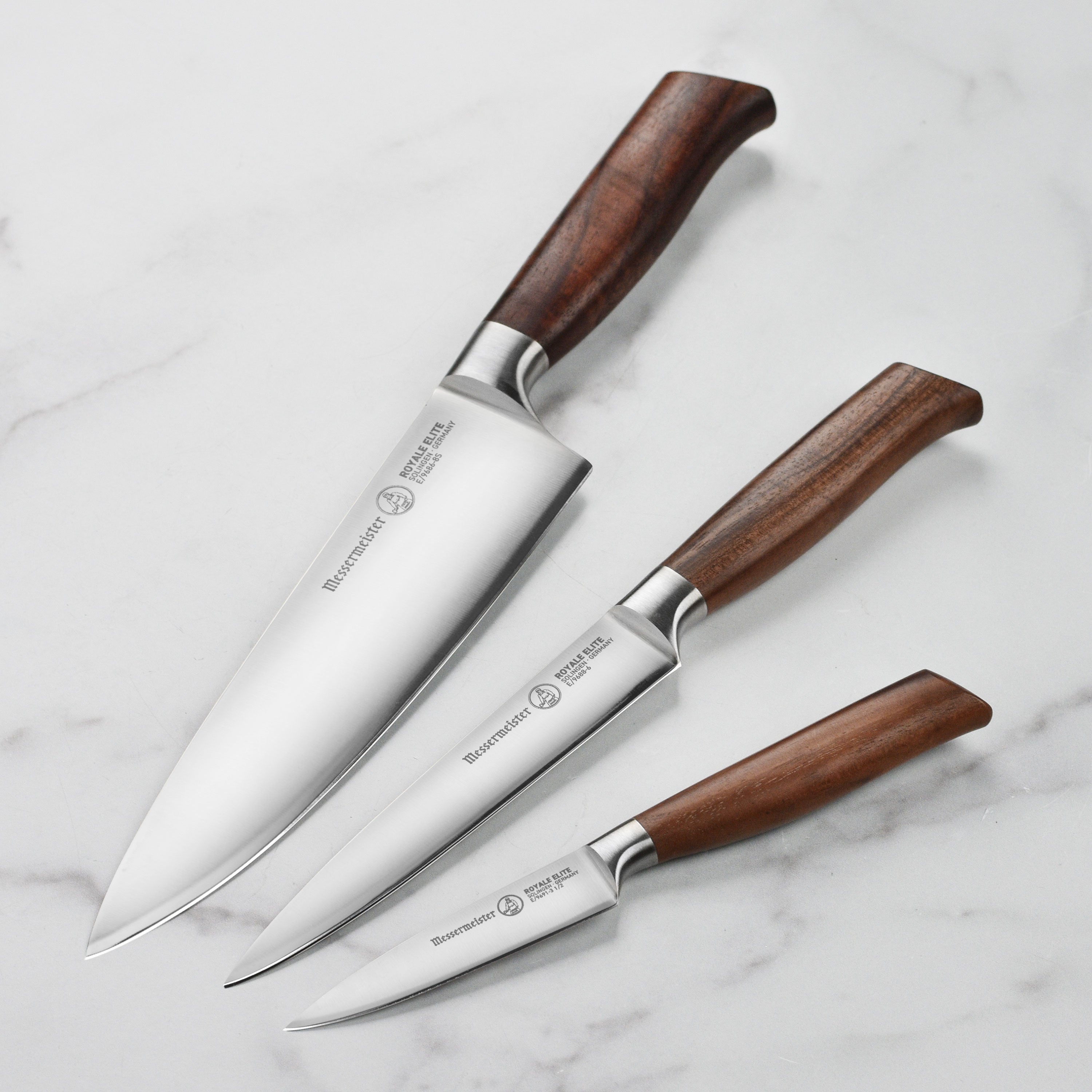 Messermeister Royale Elite knife set featuring a sharp German stainless steel blade and elegant walnut handle.