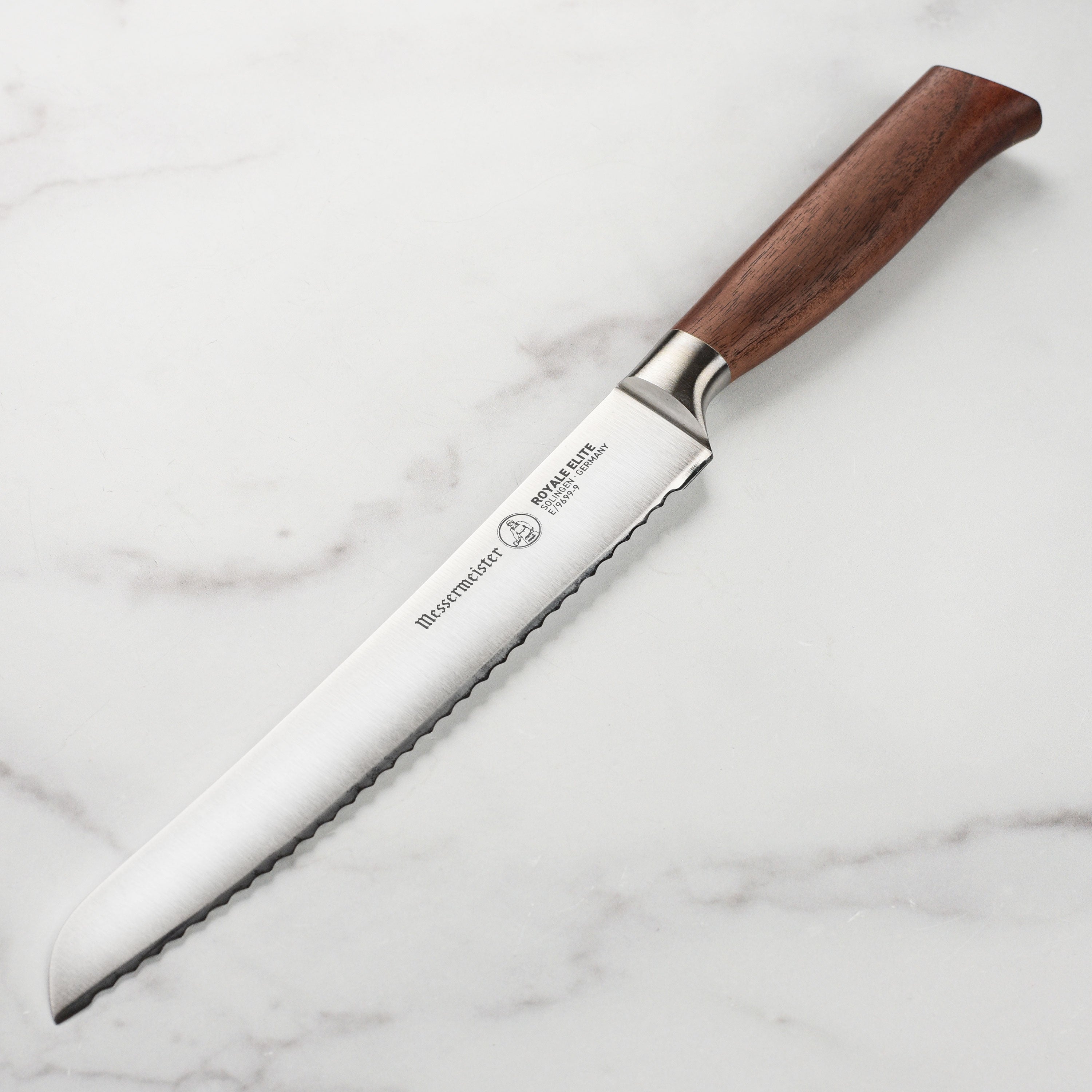 Front view of the Messermeister Royale Elite 9-inch bread knife with forged blade and ergonomic handle