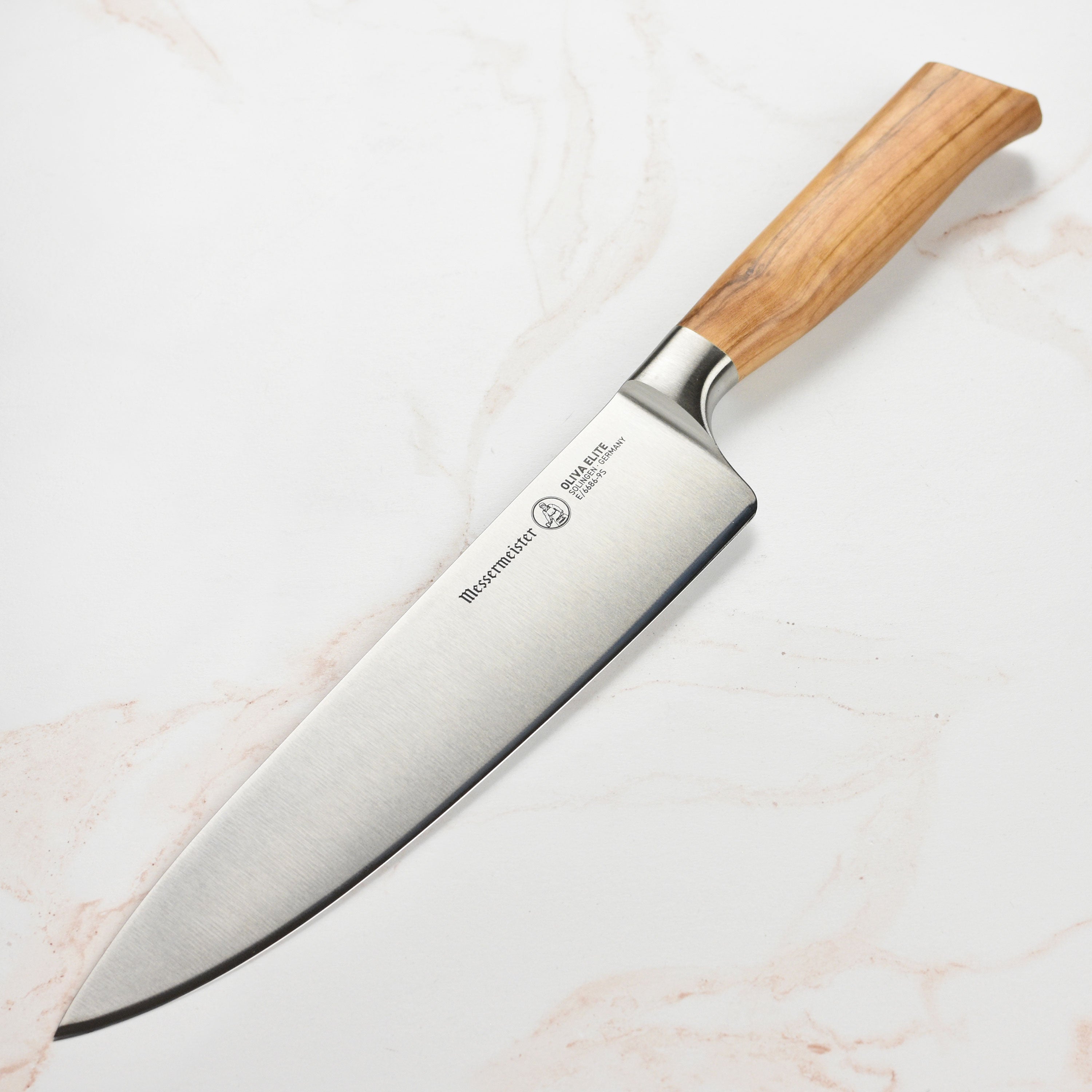 Elite 9-Inch Chef's Knife with ergonomic olive wood handle, ideal for precise cooking tasks.