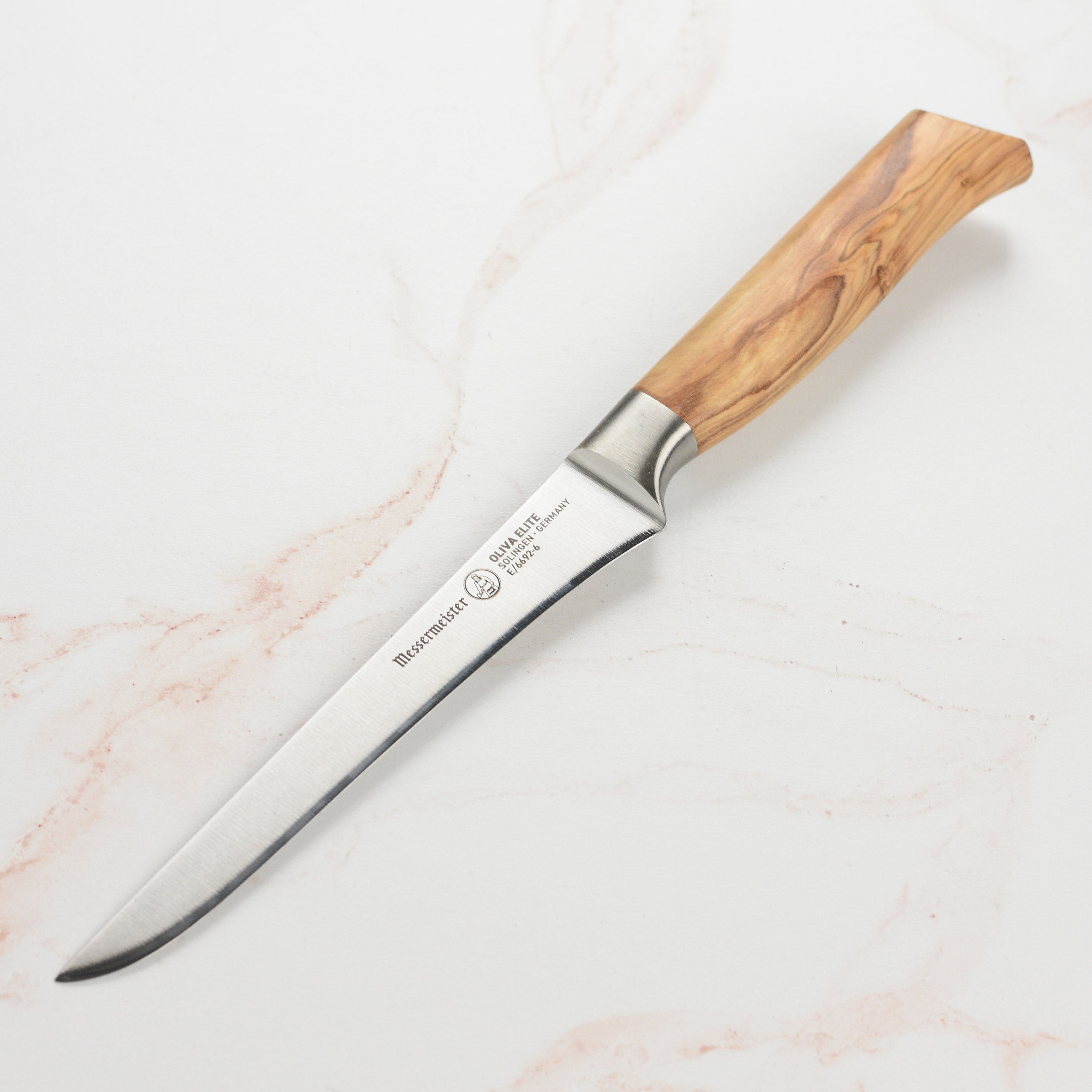 Close-up of the German boning knife blade showing sharp edge