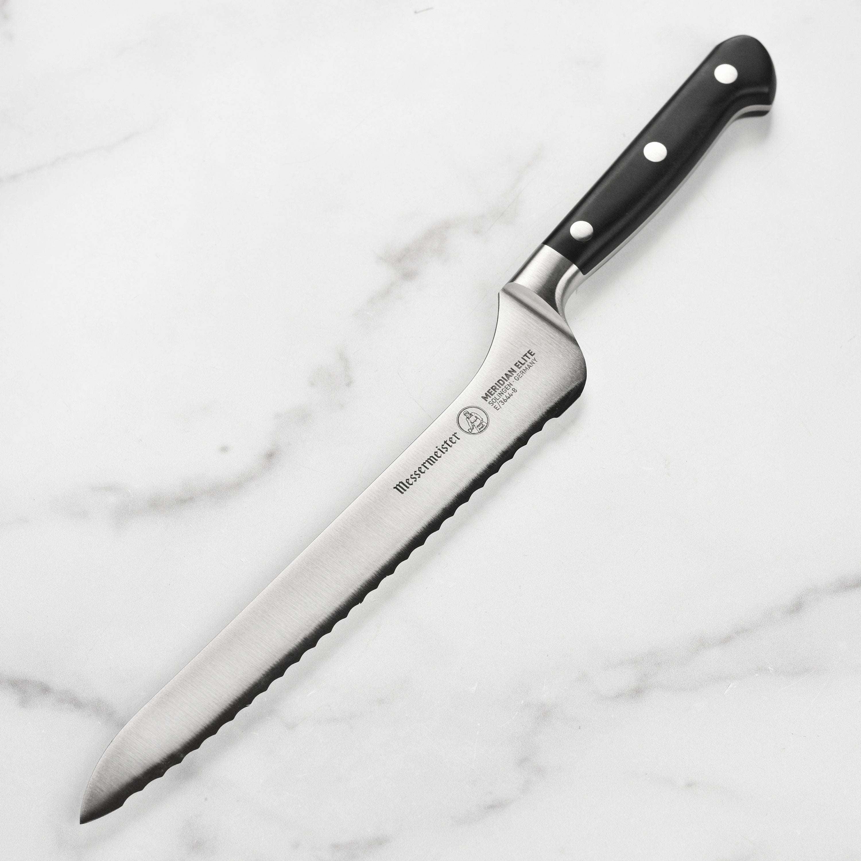 Elite German offset bread knife showcasing its ergonomic handle and polished blade.