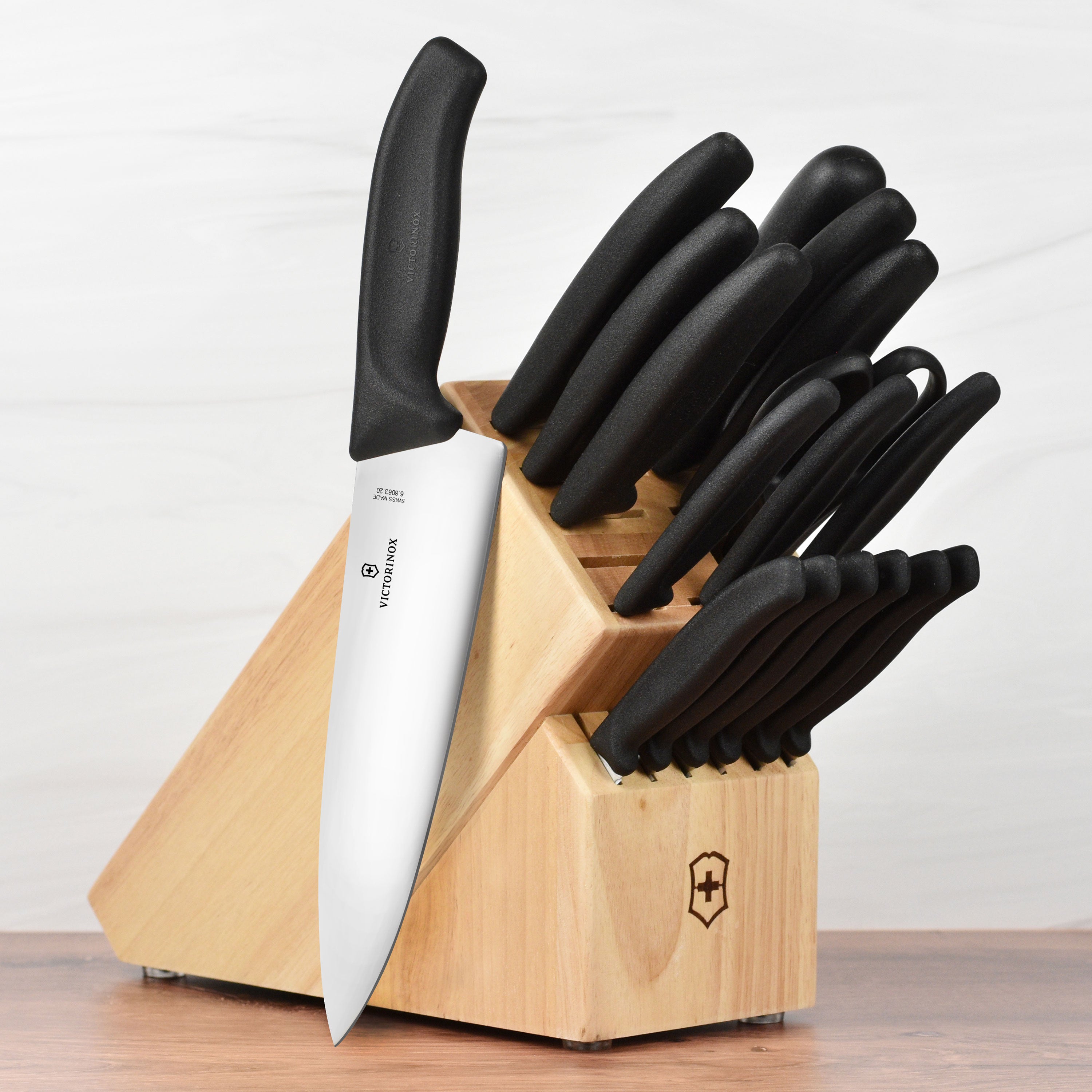 Victorinox Swiss Classic 18-piece knife set displayed in a stylish kitchen