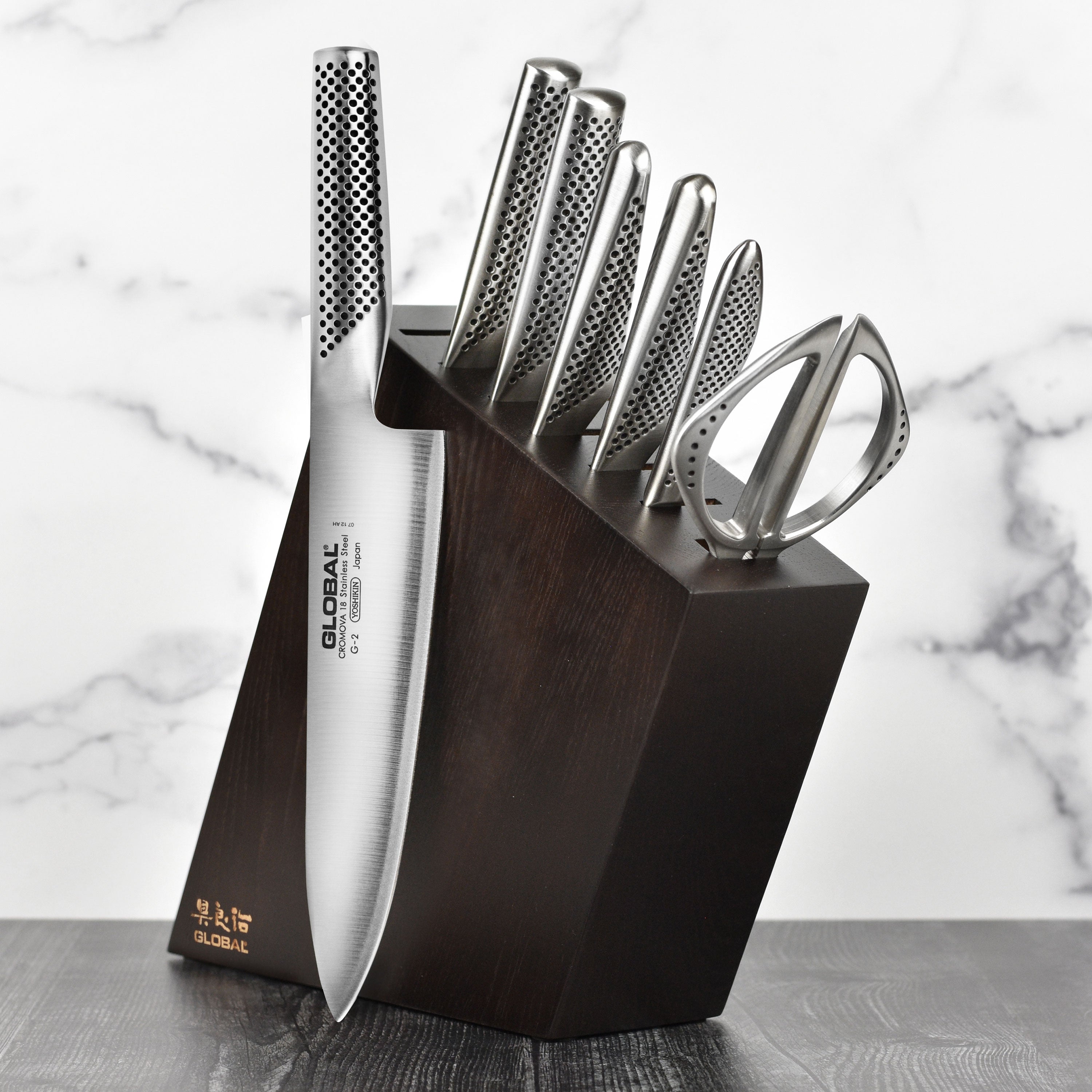 Side view of the Global premium knife set showcasing the elegant design and blade quality.