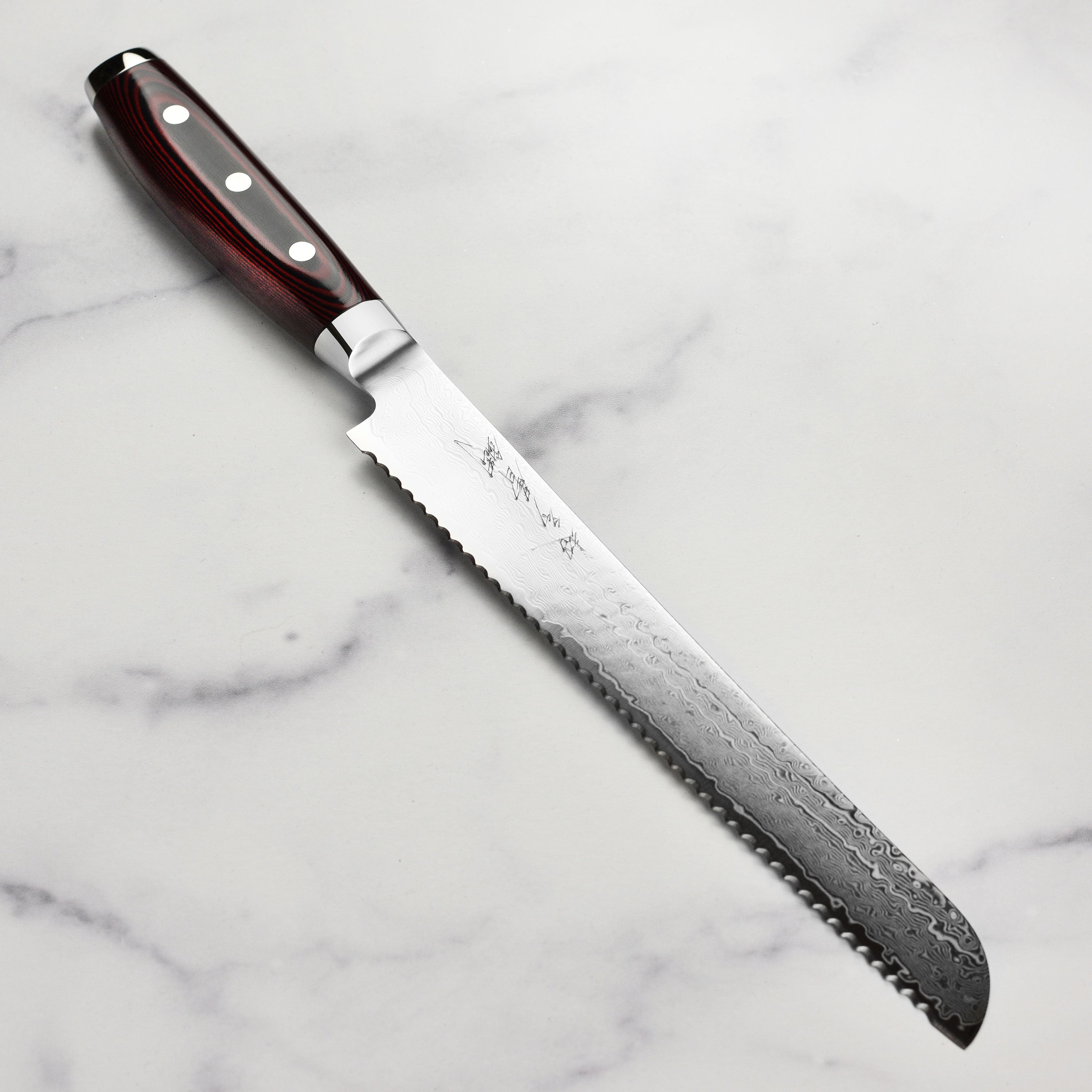 Side view of the Yaxell Super Gou SG2 bread knife showcasing its blade and handle design.