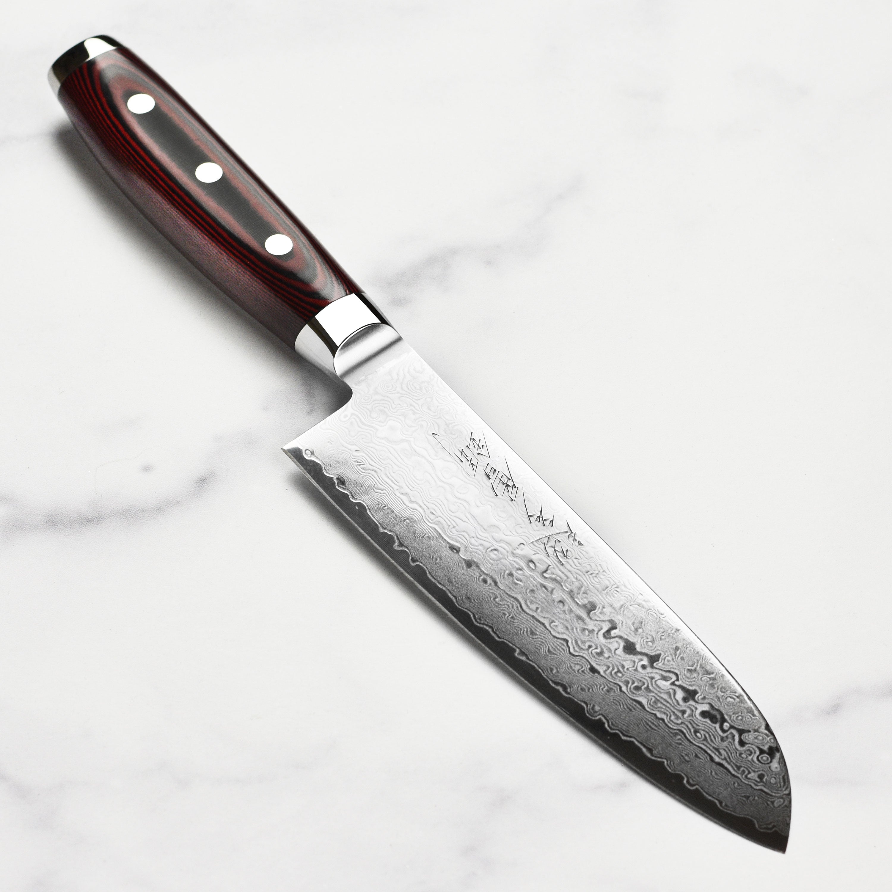 Yaxell Super Gou SG2 Santoku knife layered blade close-up