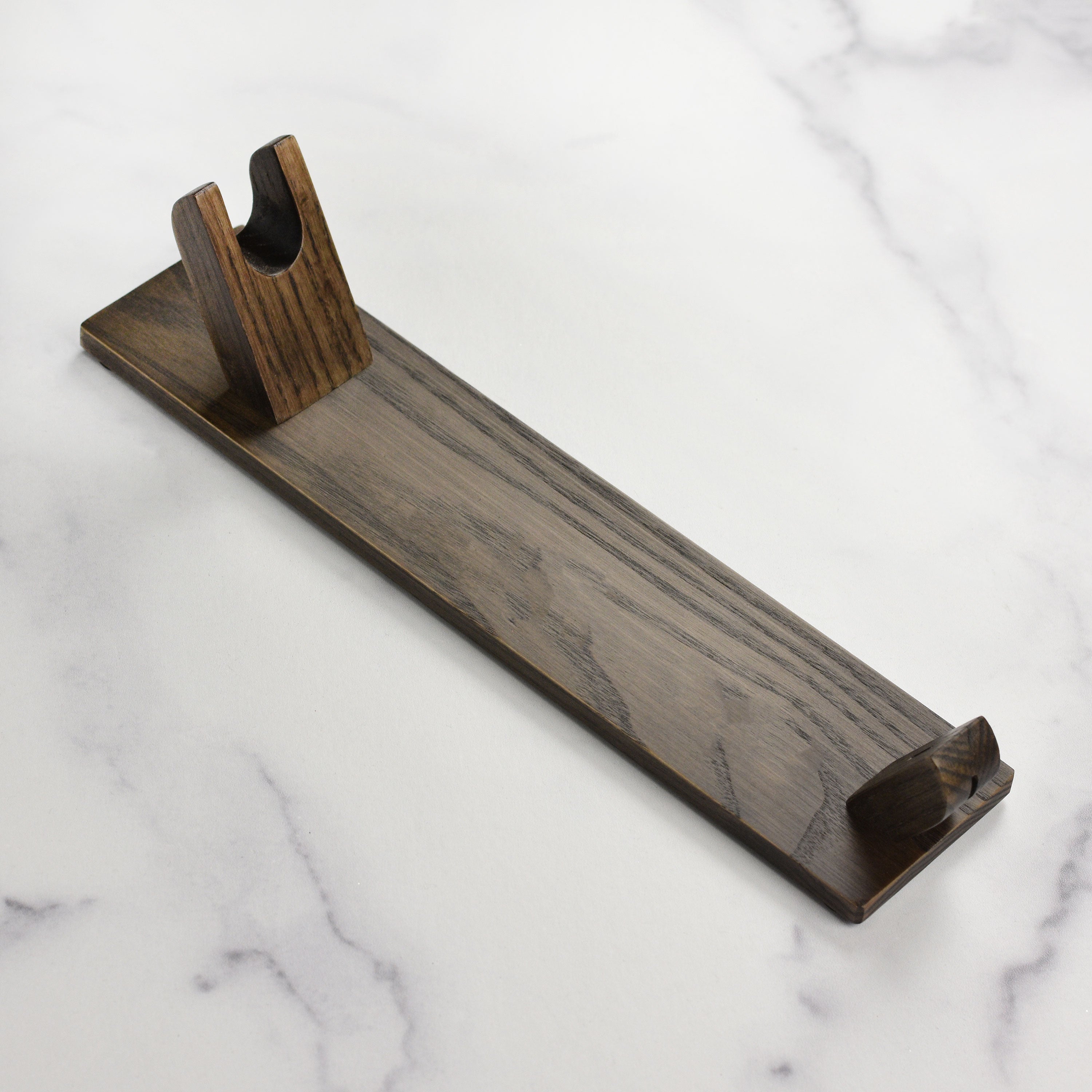 Close-up of Yaxell knife stand showcasing hardwood finish and knife slots