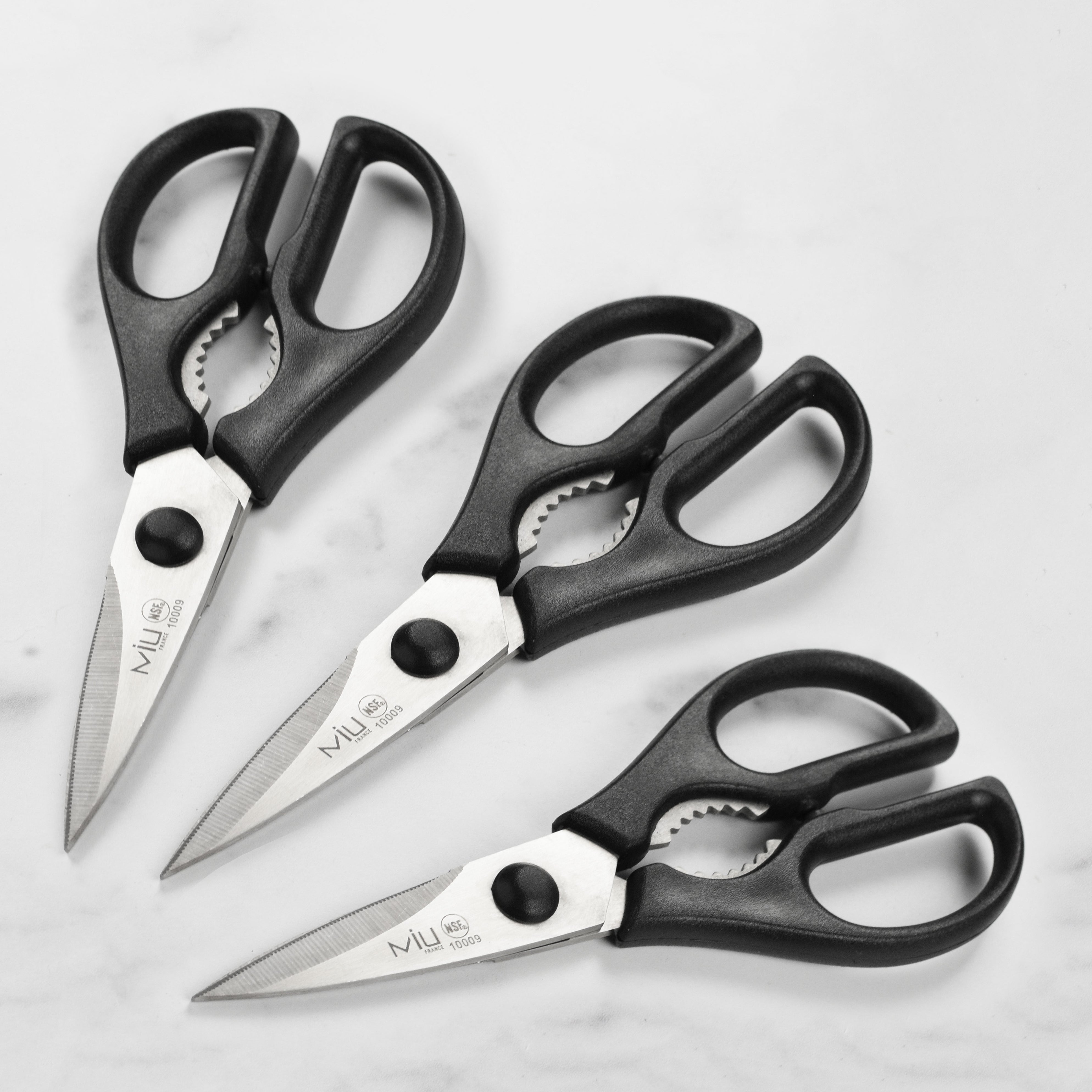 Versatile stainless steel kitchen shears set showcasing their sharp blades and comfortable handles.