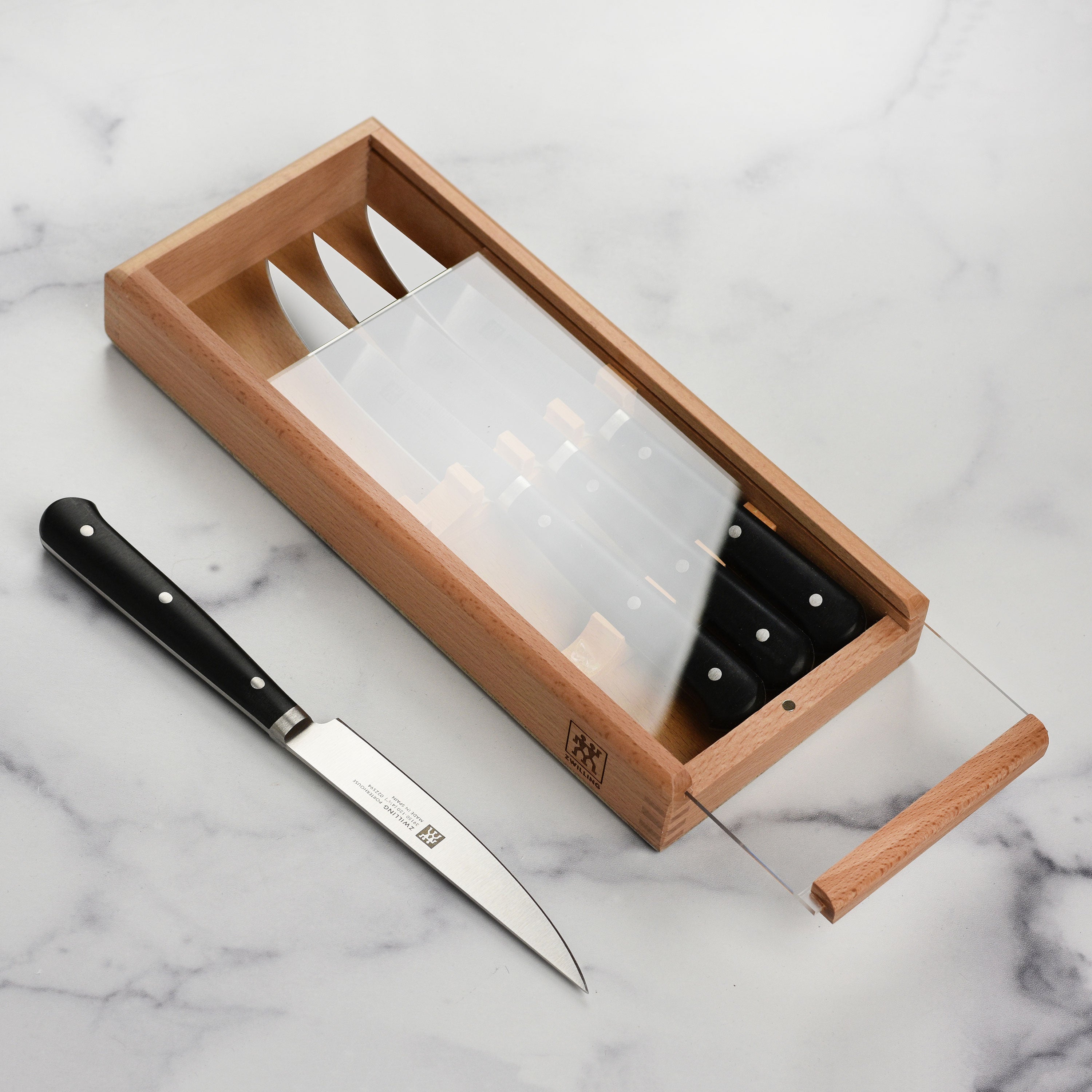 Close-up of Zwilling steak knives showcasing sharp blades and comfortable handles