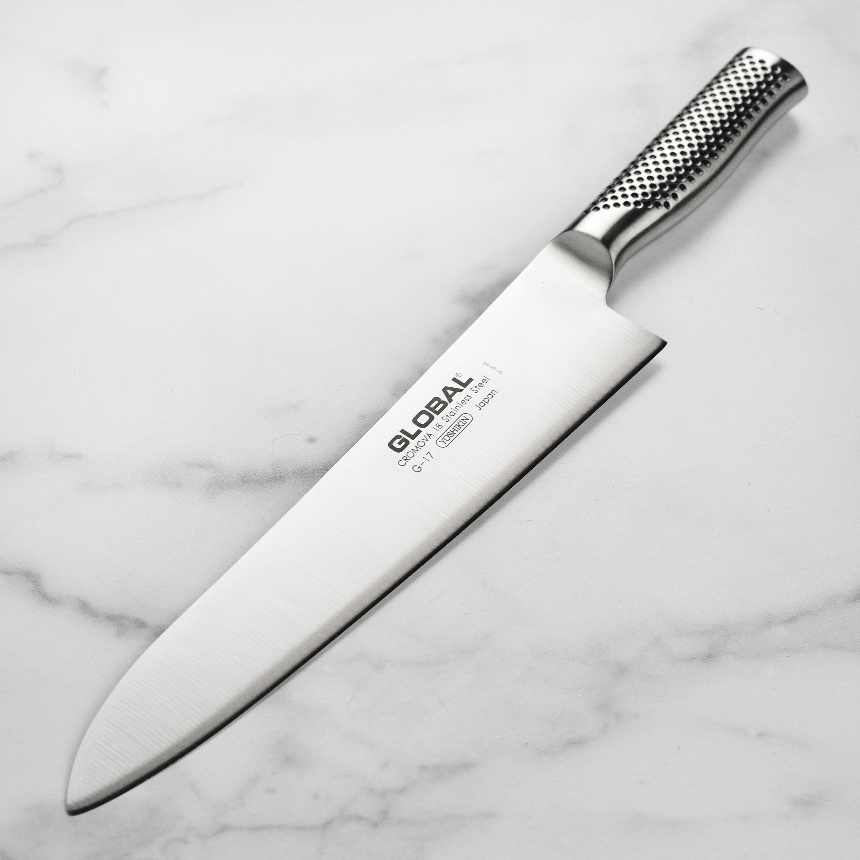 Side profile of the ZenForge chef's knife displaying 11-inch blade length and convex edge