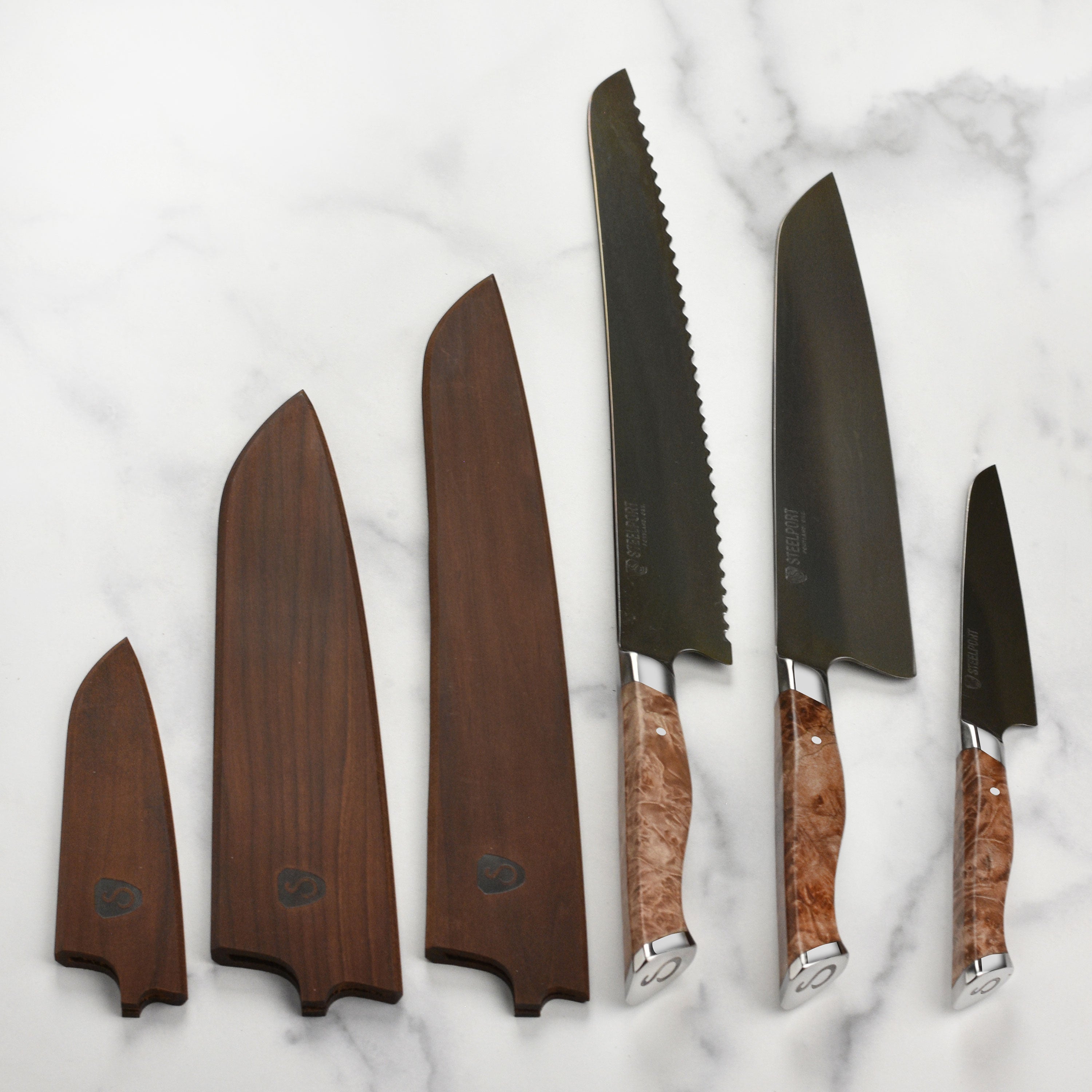 Steelport Premium Carbon Steel Knife Set showcasing the ergonomic handle and sharp blade from a side angle.