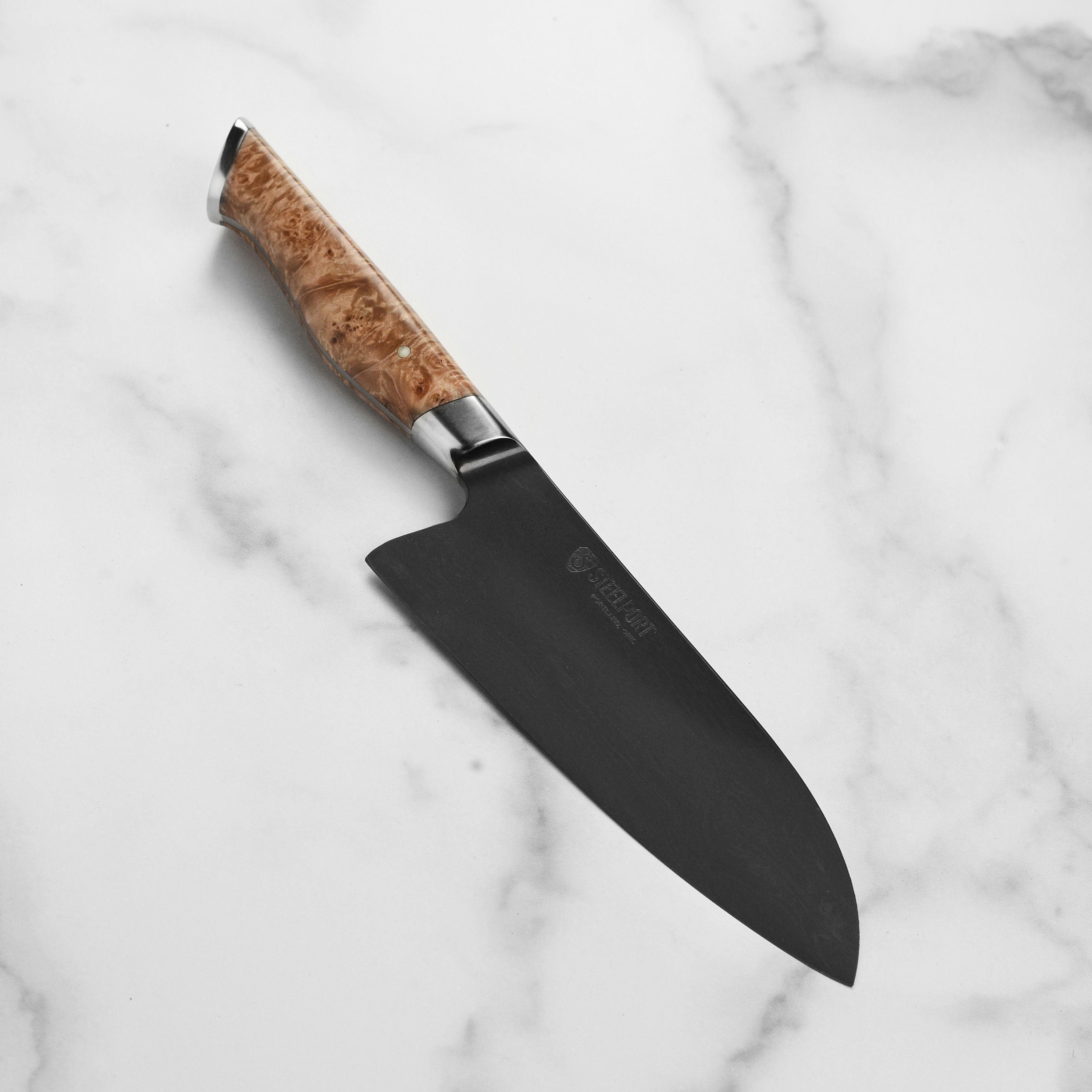 Steelport 6-inch chef knife showcasing the elegant handle and sharp blade.