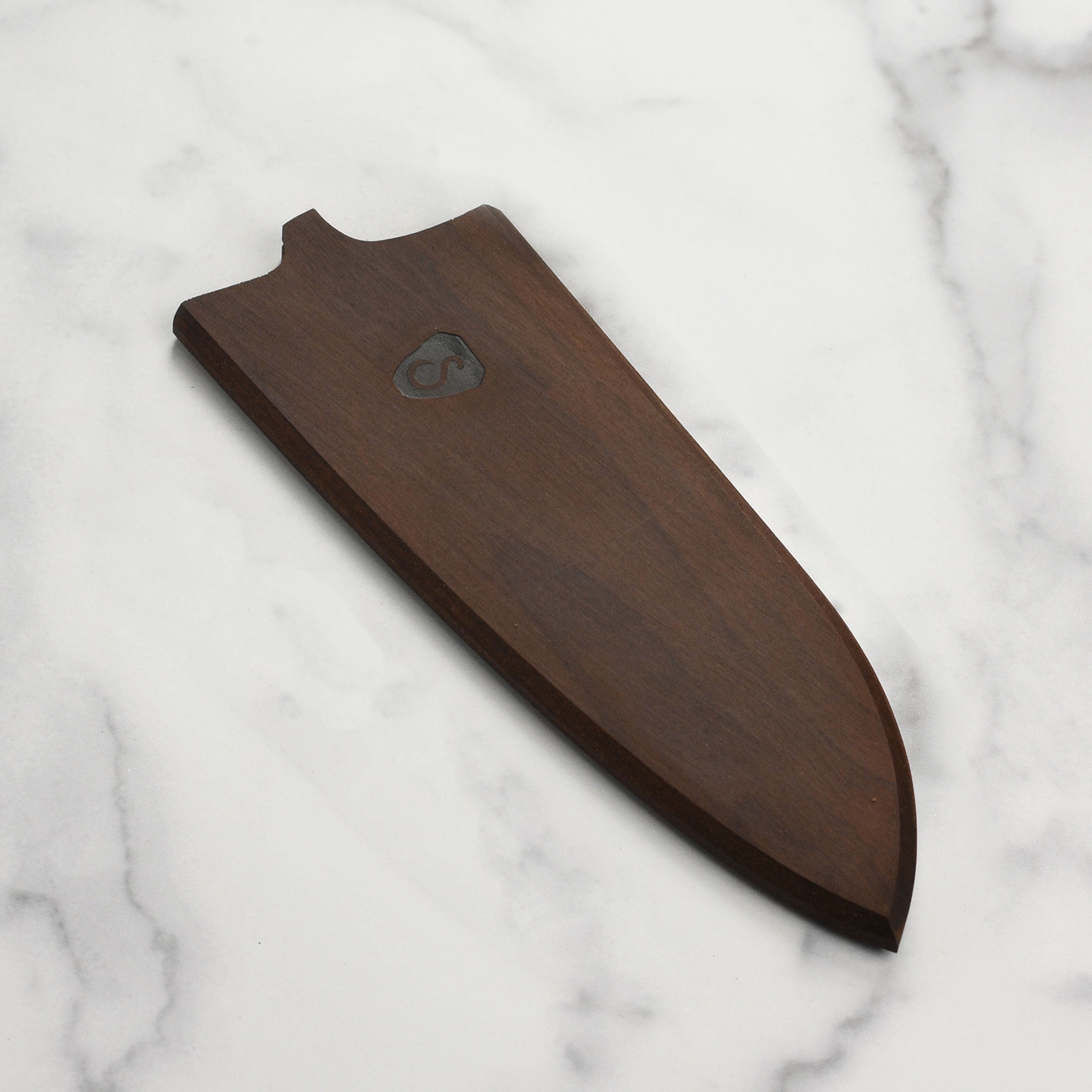 Oregon maple magnetic knife sheath showcasing a chef knife securely held