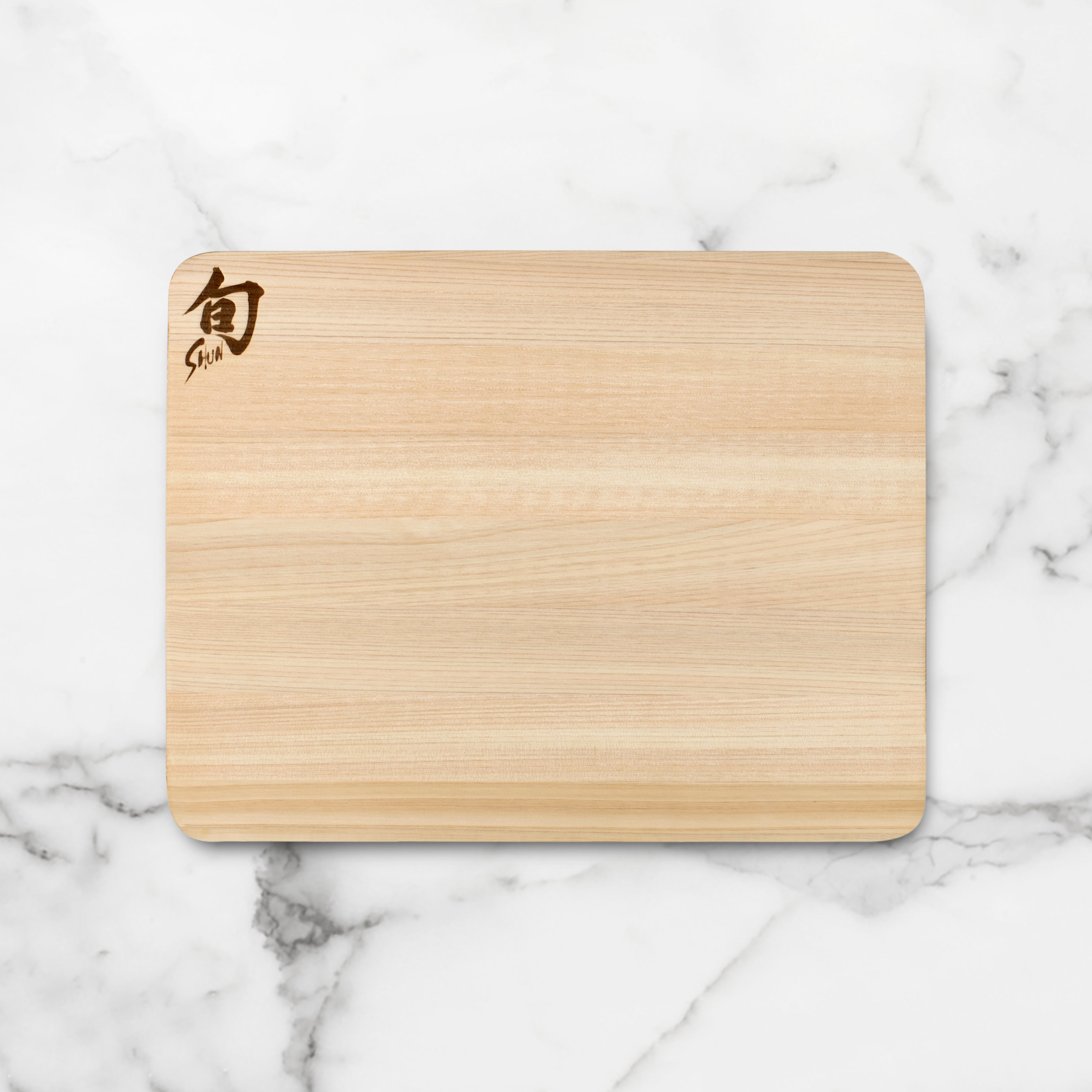 Hinoki wood reversible cutting board for chefs, highlighting its smooth surface and craftsmanship.