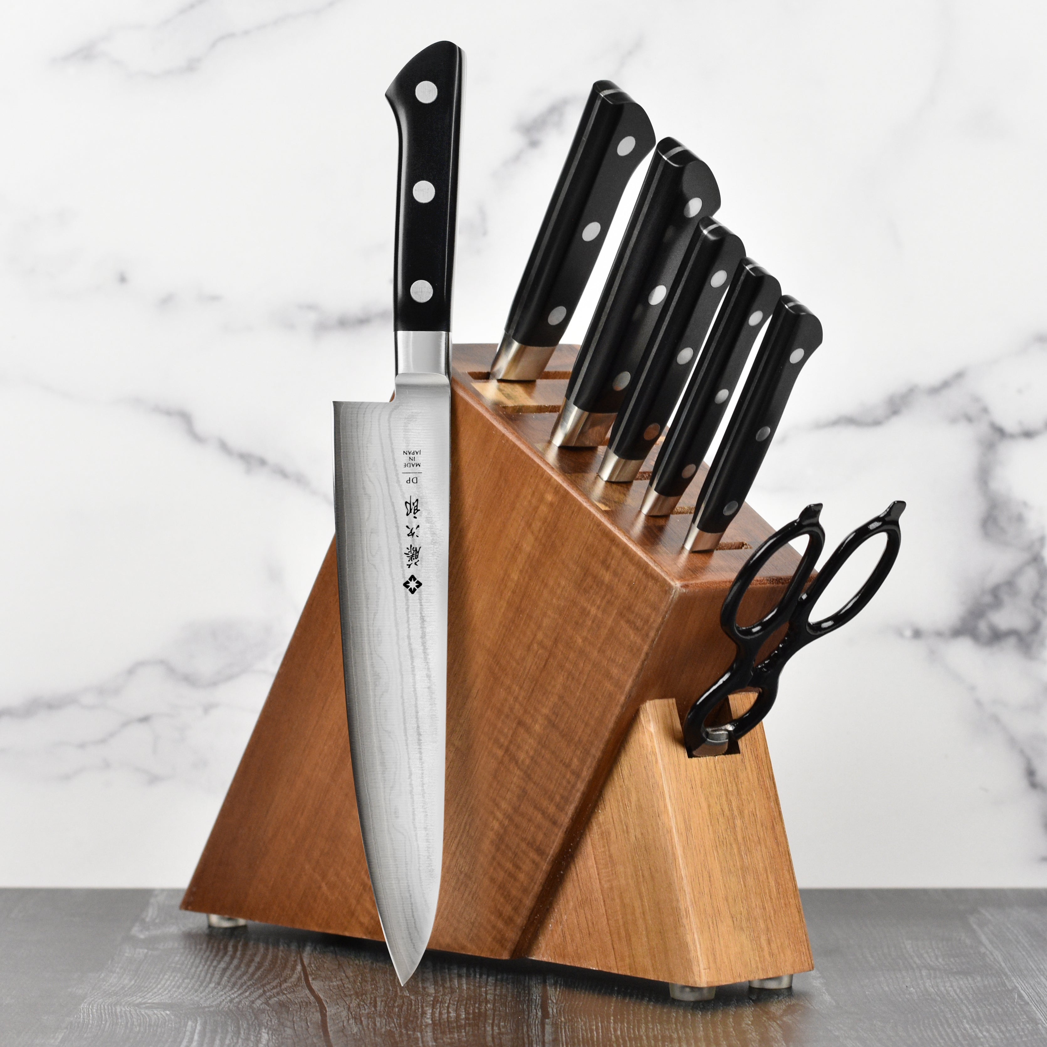 Japanese Damascus chef knife with intricate pattern for precise slicing