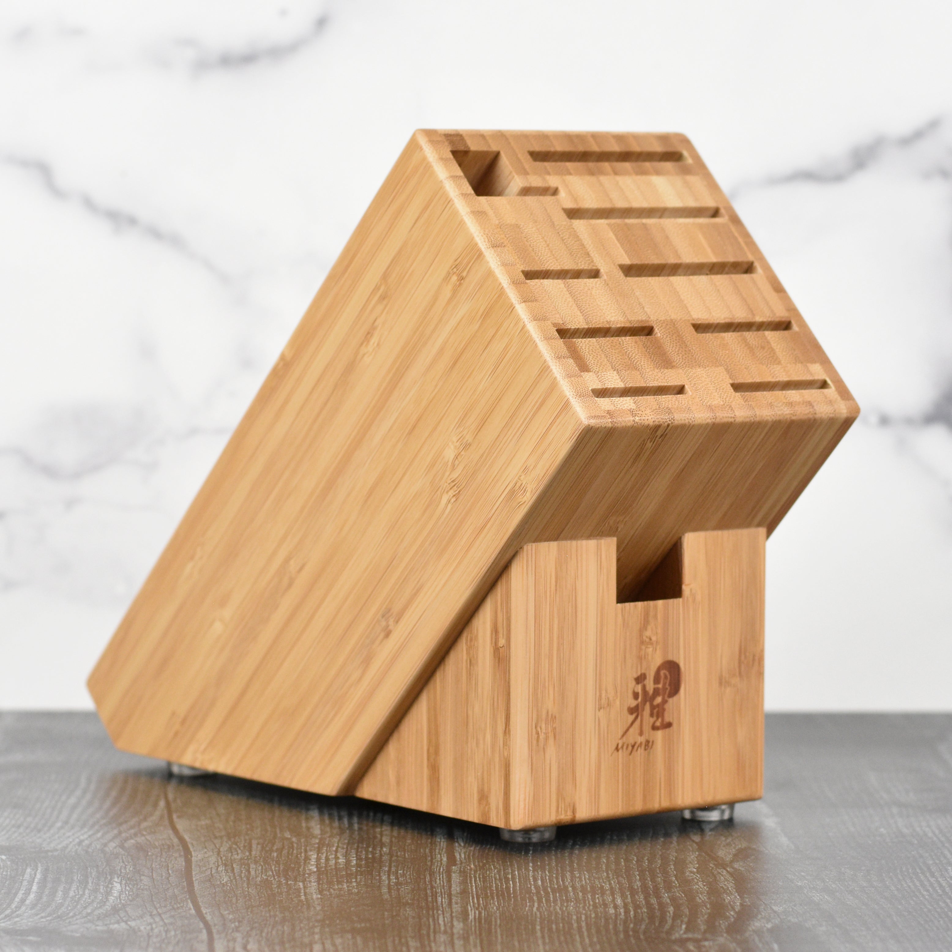 Front view of the elegant bamboo knife holder showcasing its slots for kitchen knives.