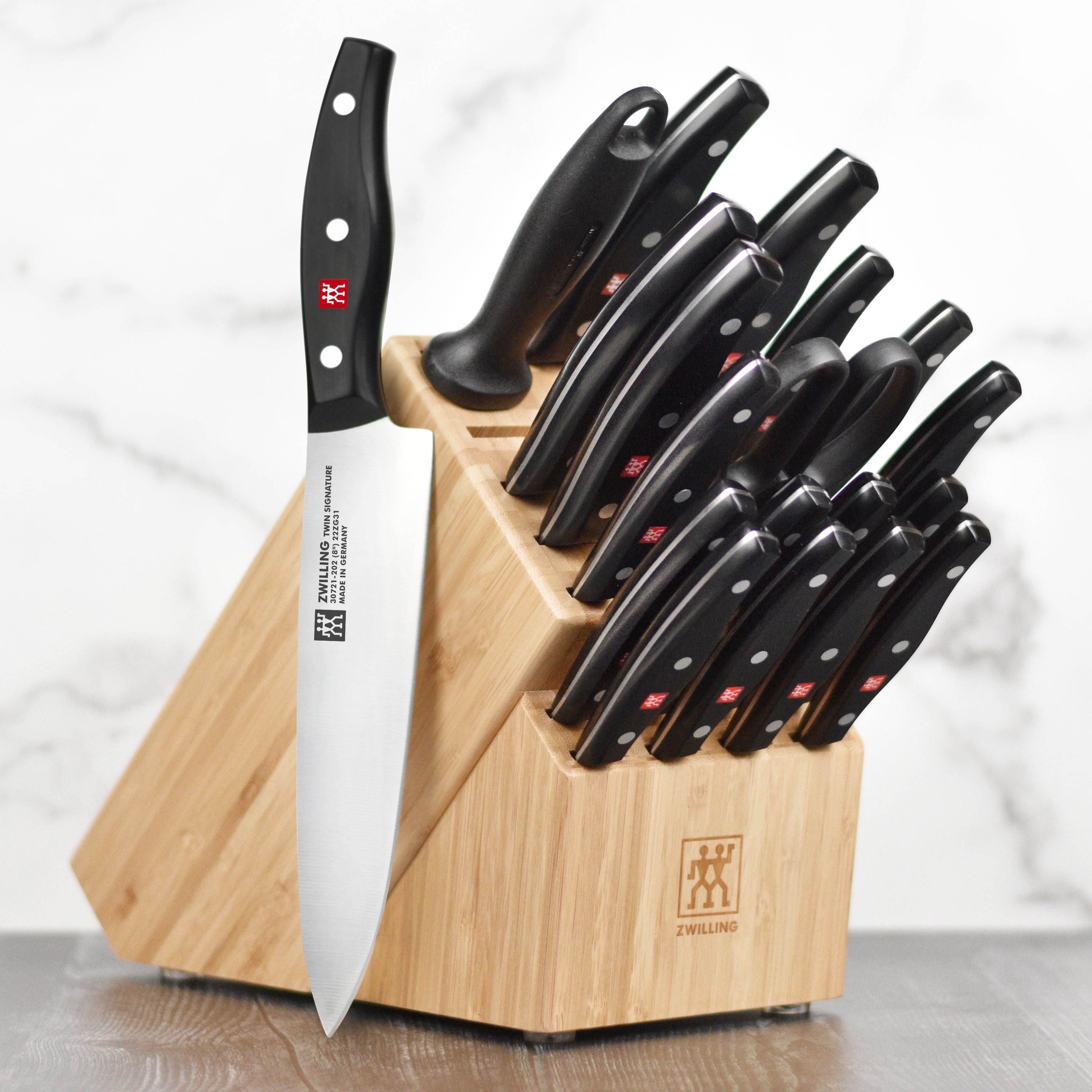 Close-up view of the Zwilling Twin Signature knife set highlighting the sharp, durable kitchen knives.