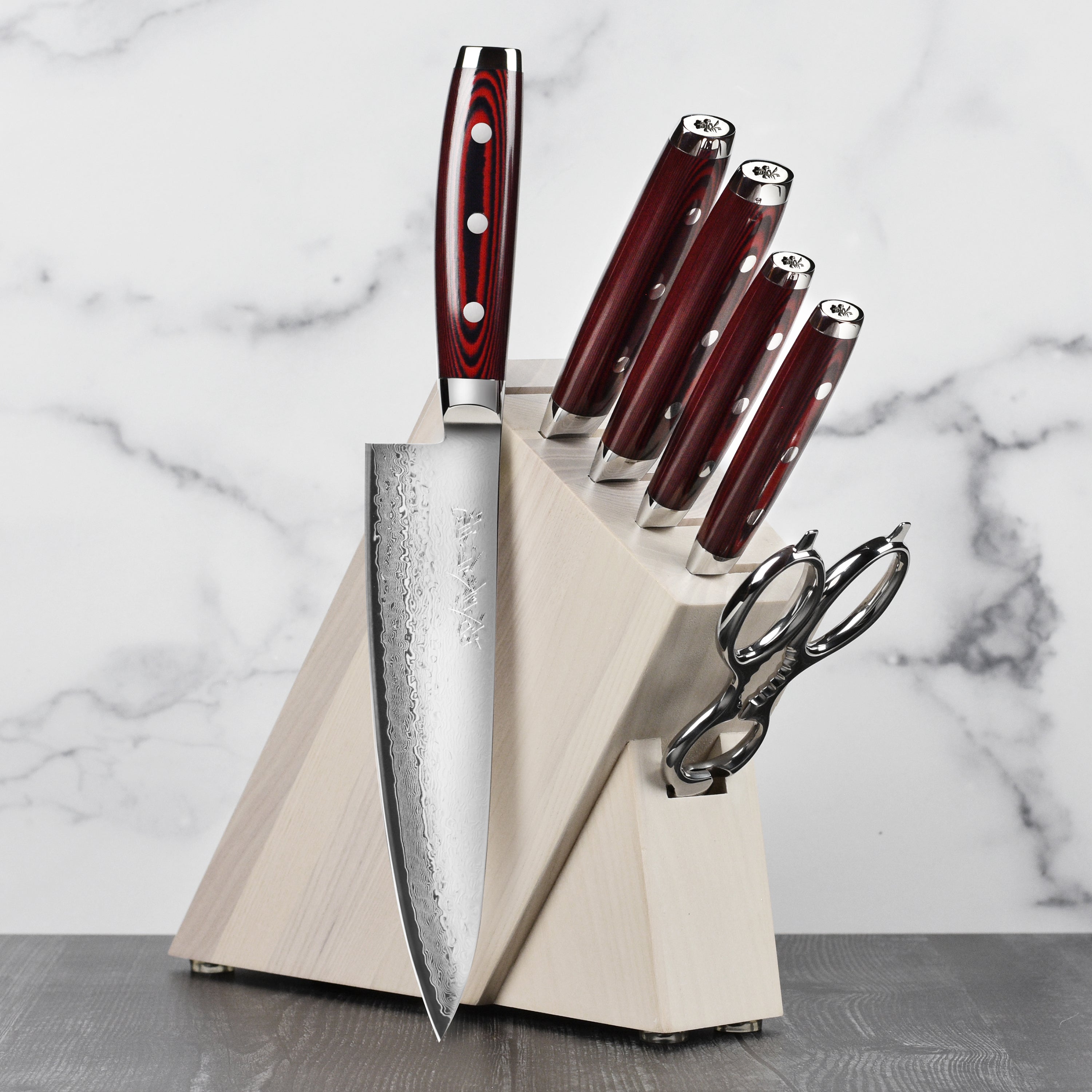 Close-up of Yaxell Super Gou SG2 Japanese chef knife blade showcasing layered steel construction