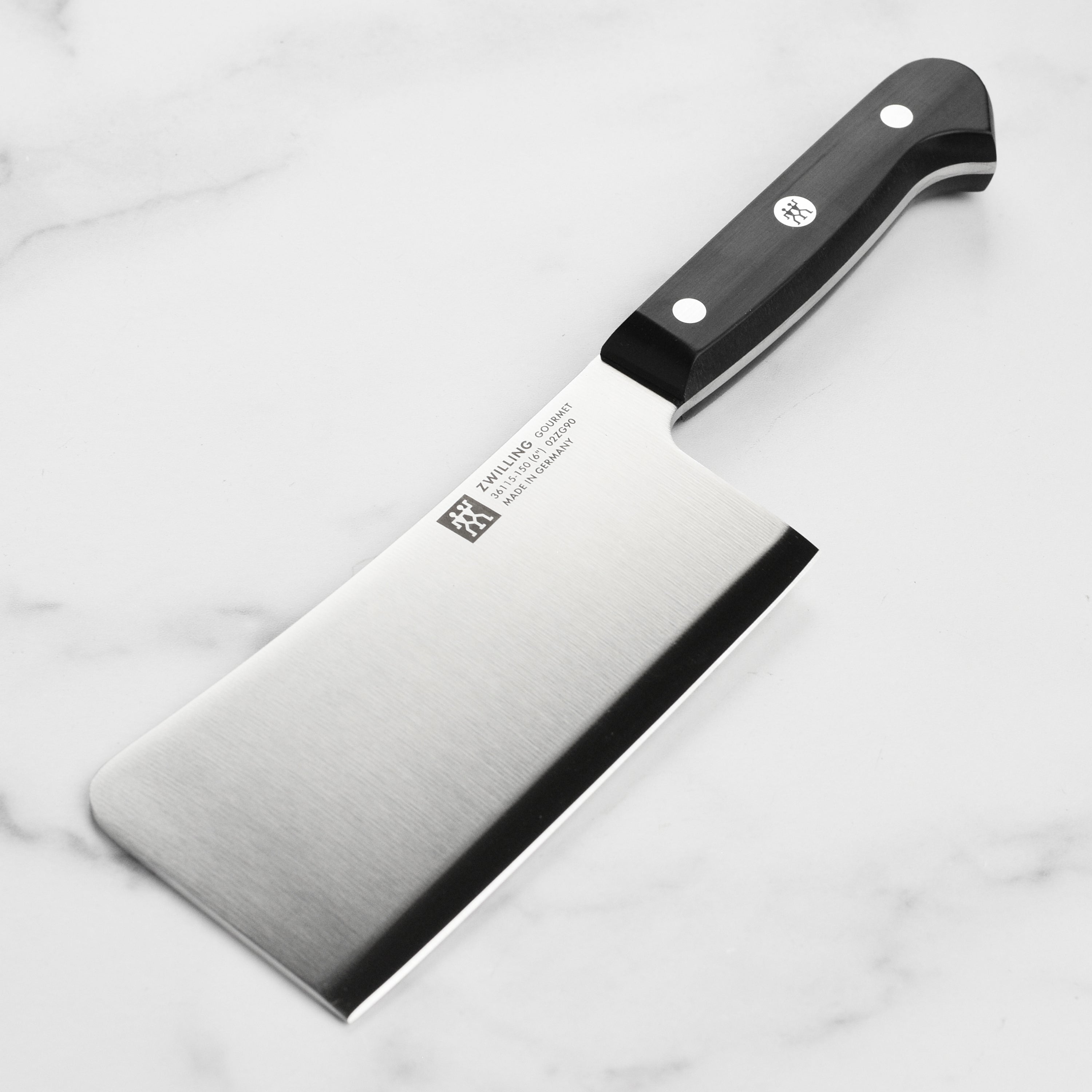 Angled top-down view of Zwilling knife showcasing its polished high-carbon blade and balanced handle