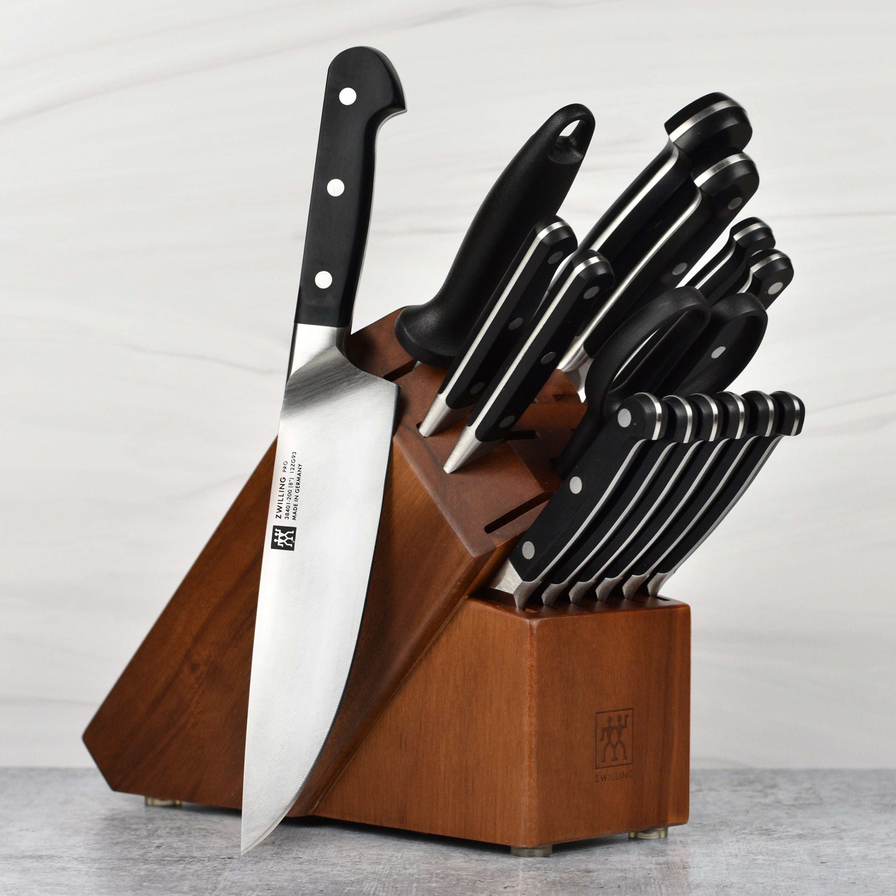 Close-up of Zwilling Pro chef knives with high carbon steel blades in a modern kitchen