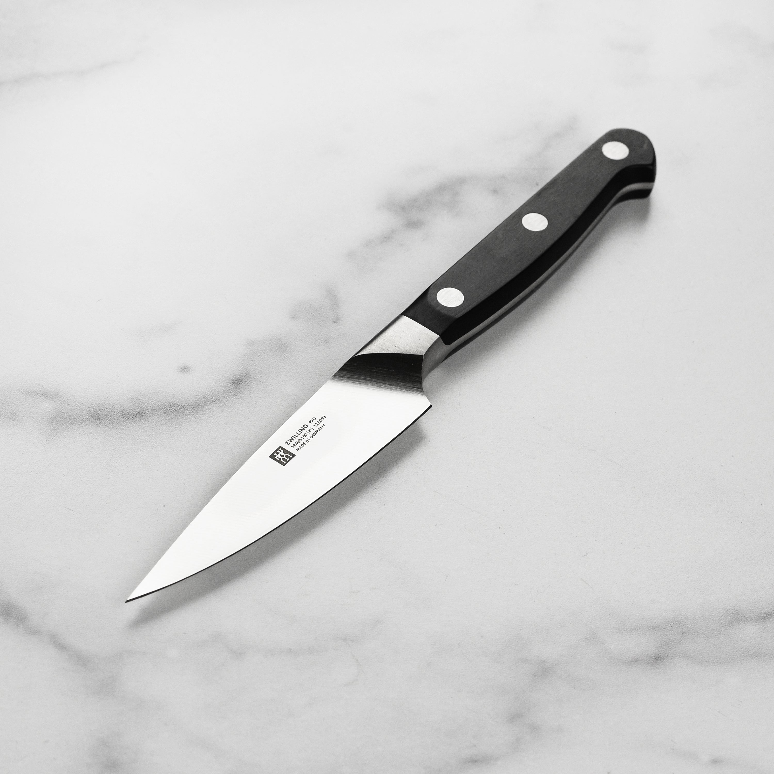 Top view of Zwilling Pro 4-inch paring knife highlighting its sharp blade and sturdy handle
