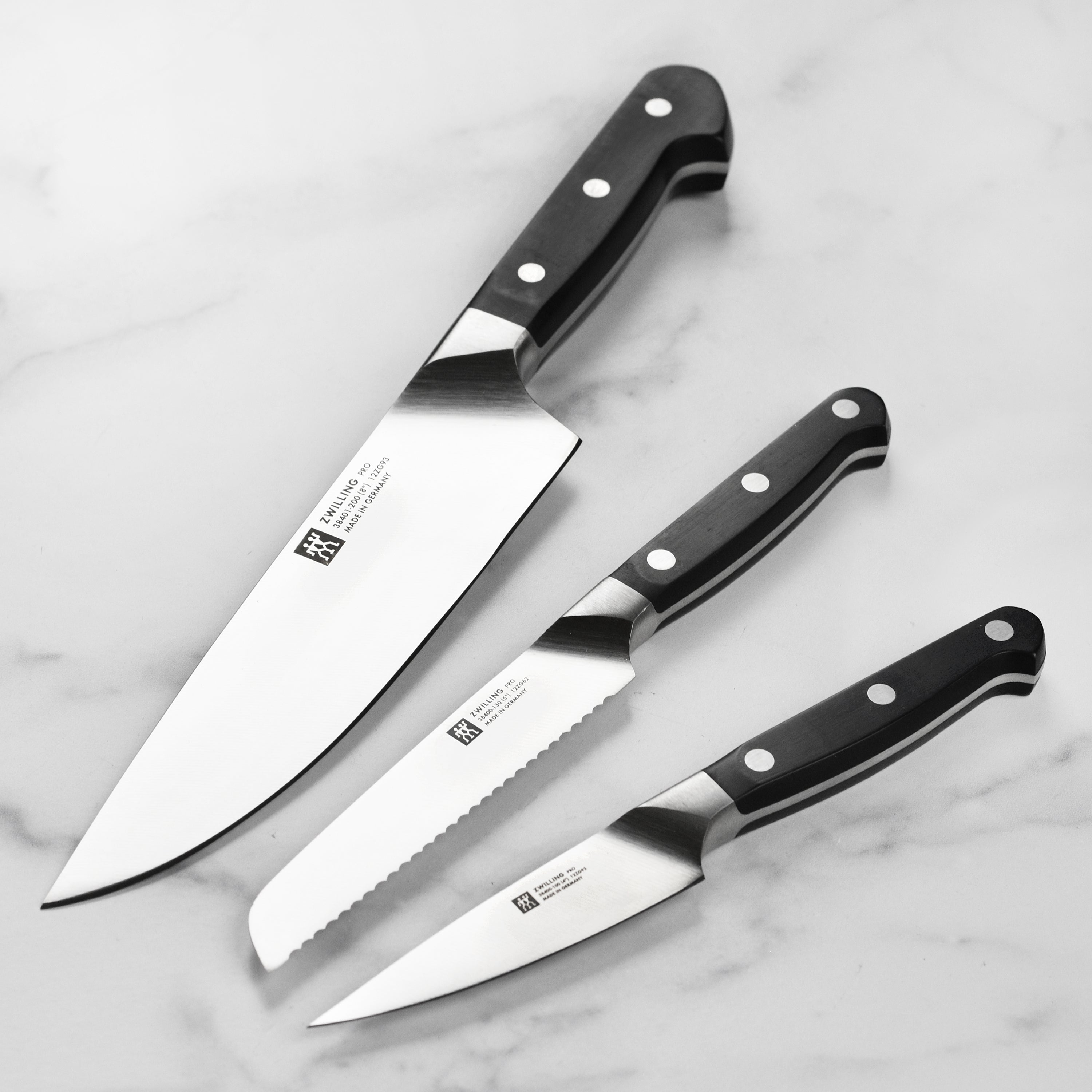 Close-up of Zwilling Pro chef knife highlighting the high carbon steel blade