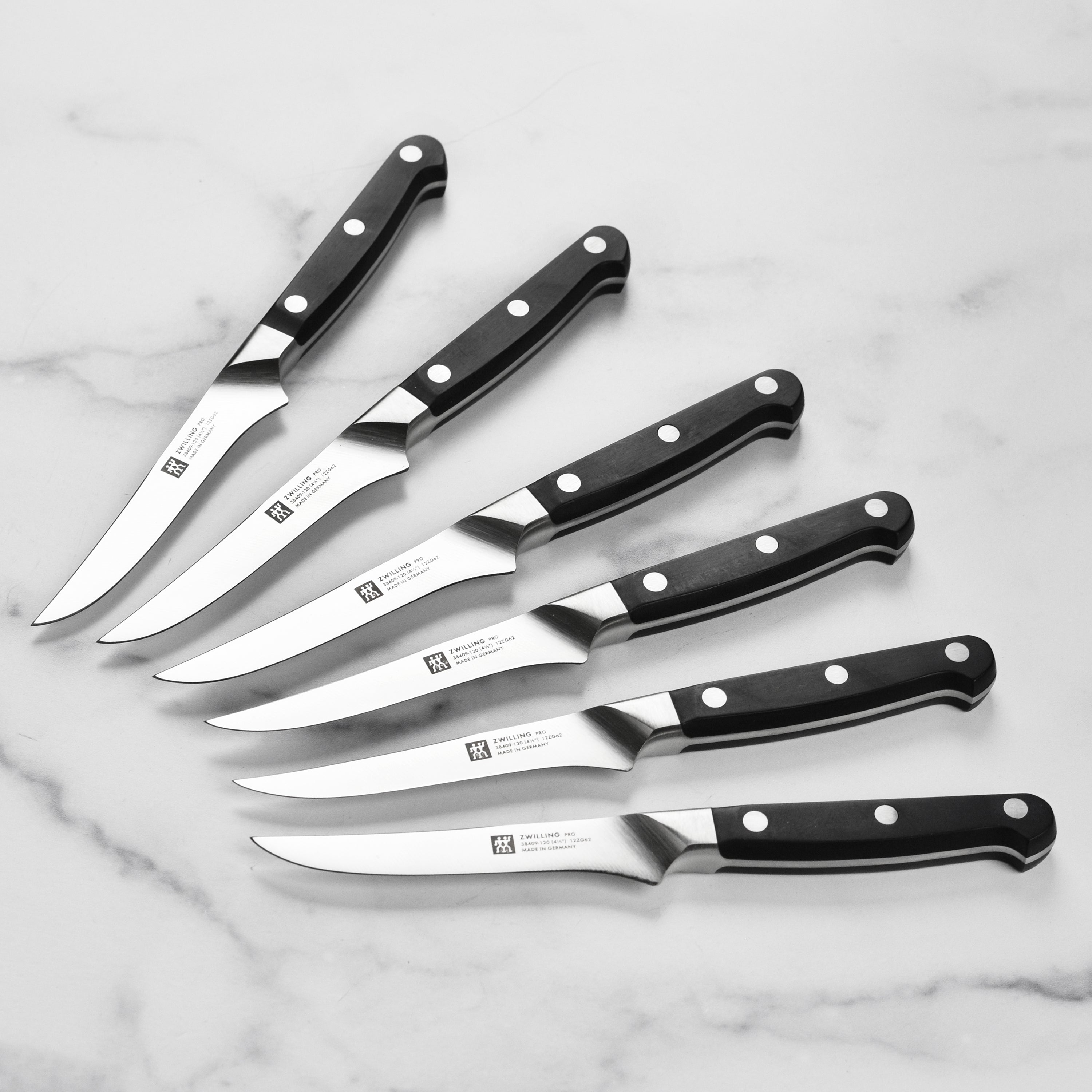 Zwilling Pro steak knives showcasing sleek high carbon stainless steel blades