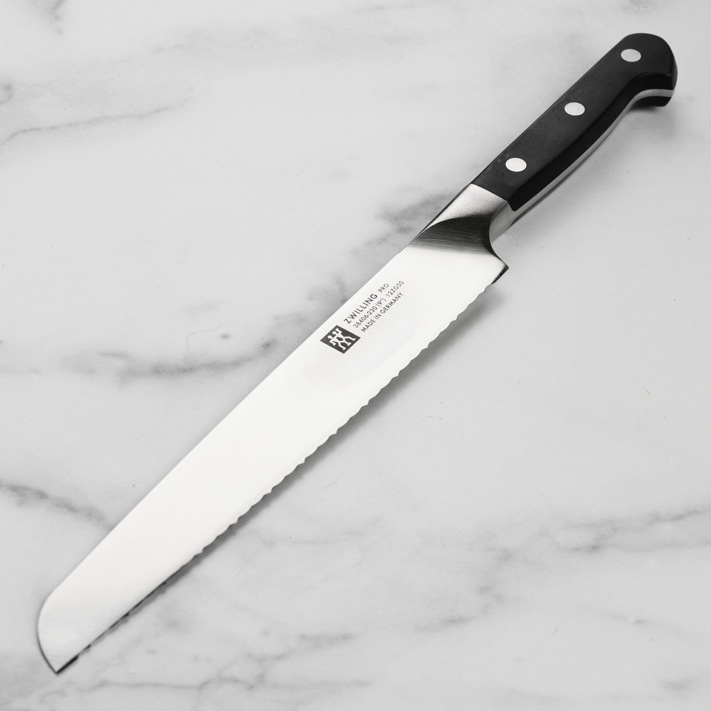 Front view of Zwilling Pro 9-inch bread knife with Z15 serration for precise bread slicing