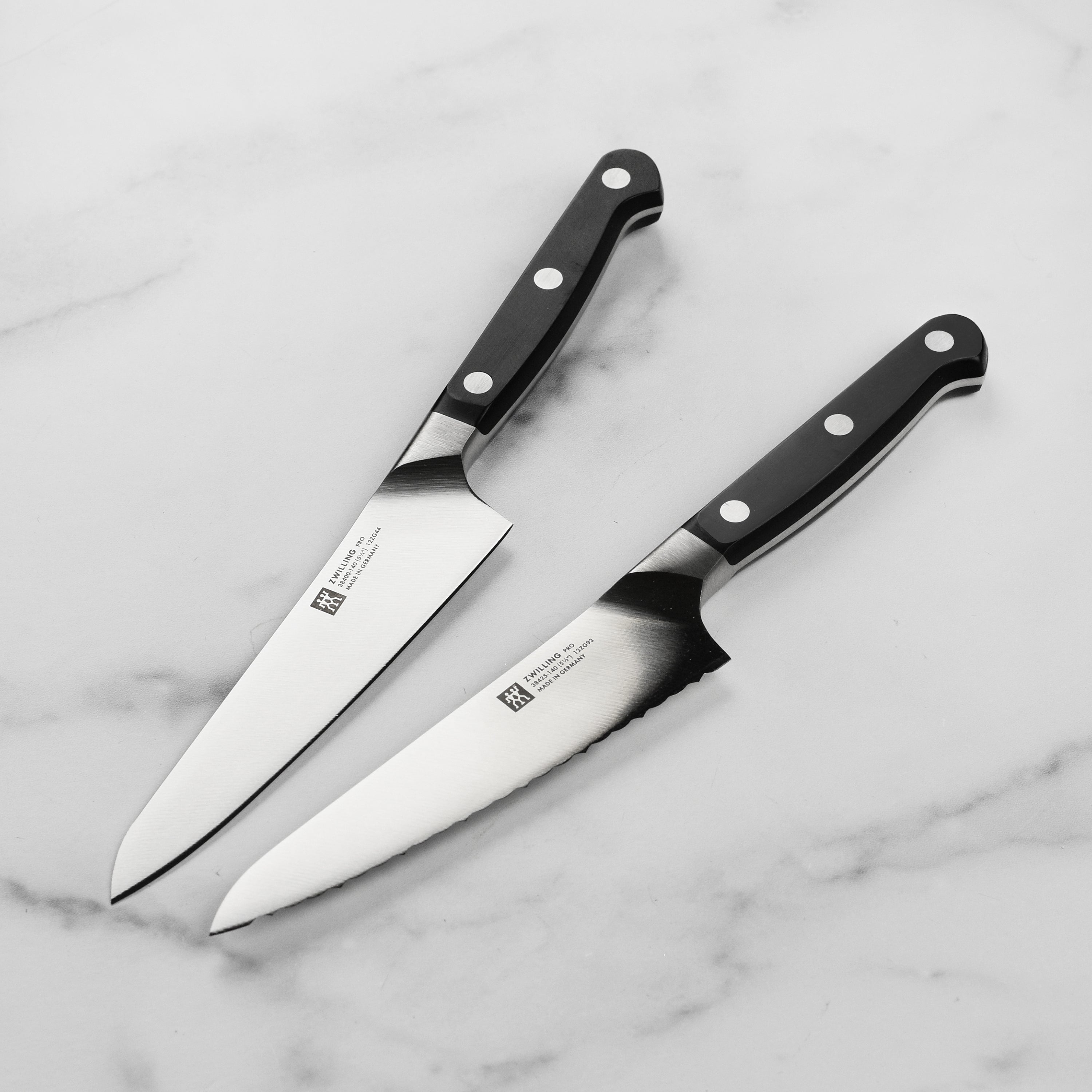 Close-up of the Zwilling Pro chef knife set highlighting the high-carbon stainless steel finish.
