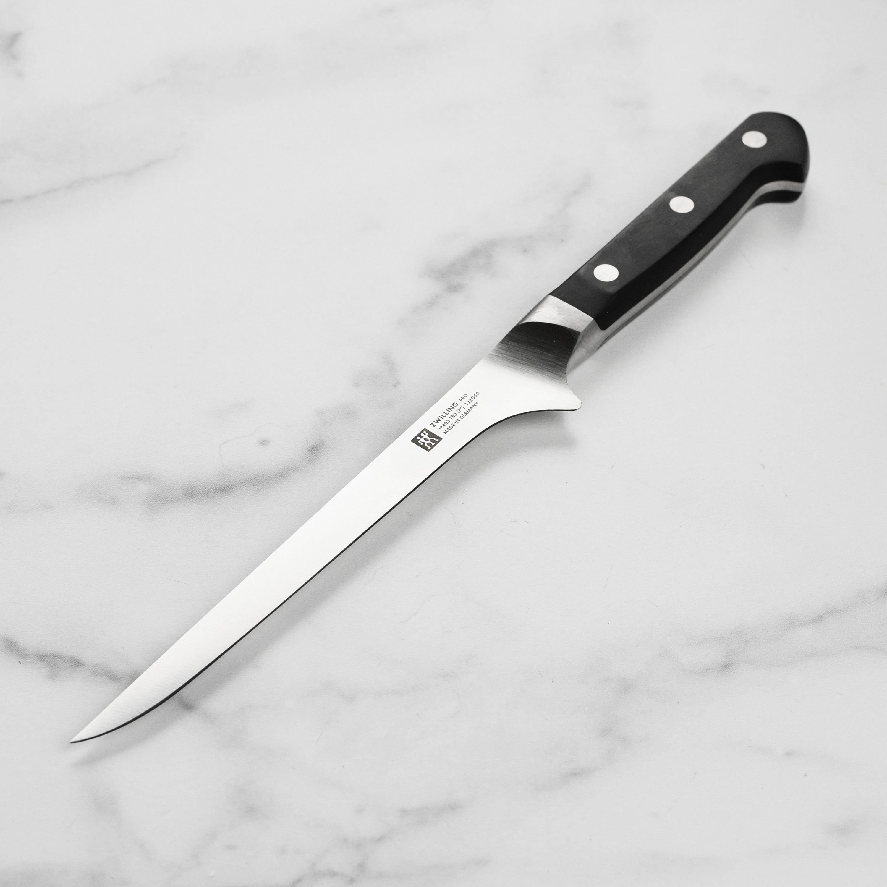 Close-up of Zwilling Pro 7-inch flexible fillet knife showing its sharp blade and ergonomic handle