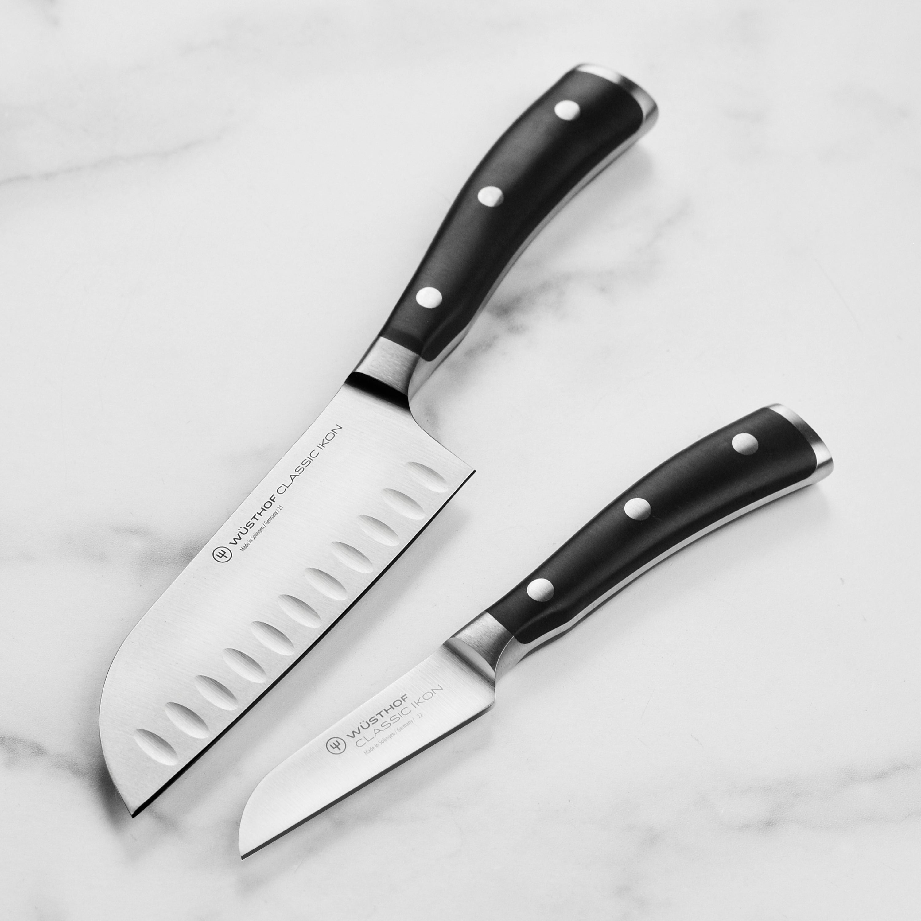 Close-up of a Santoku knife with a sharp edge for precision cutting