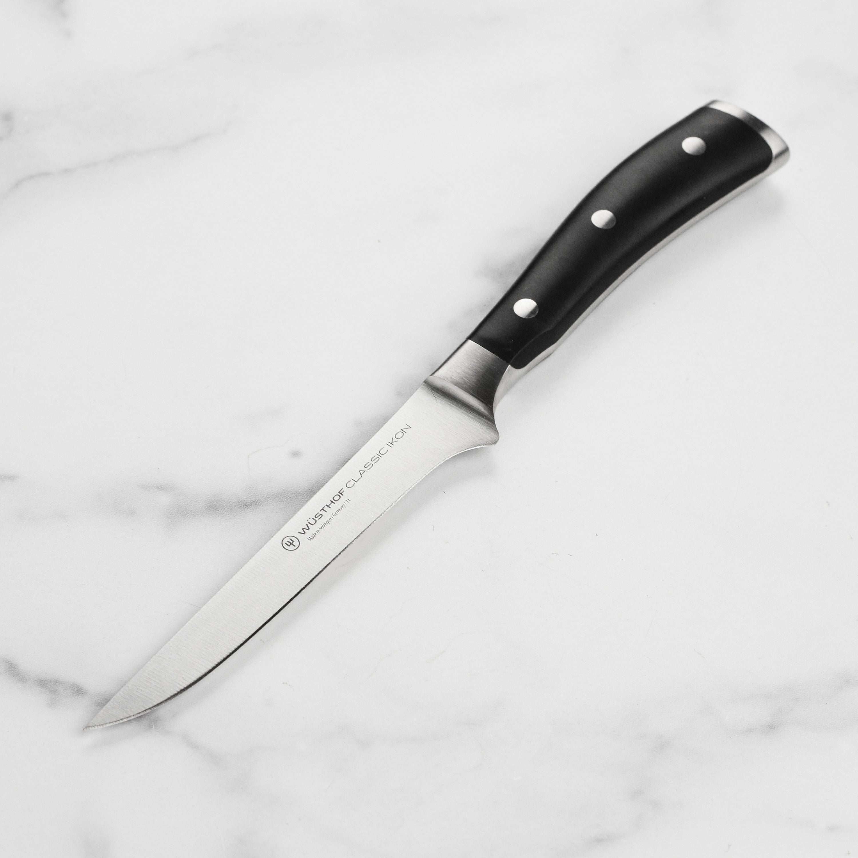 Wüsthof Classic Ikon 5-inch boning knife with sharp blade for meat prep