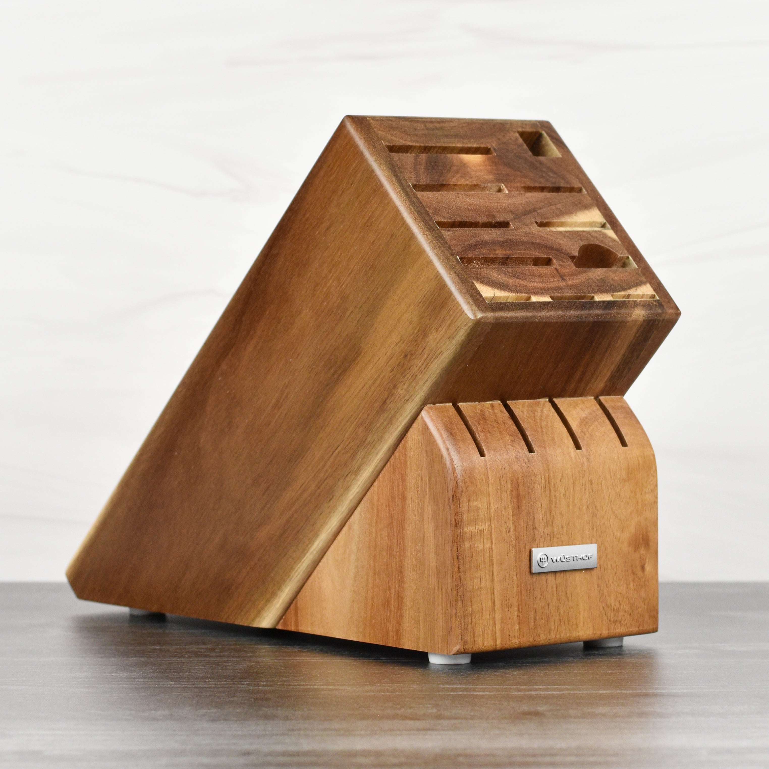 Wusthof Acacia Knife Block with 15 slots for safe knife storage, showing top-down view.