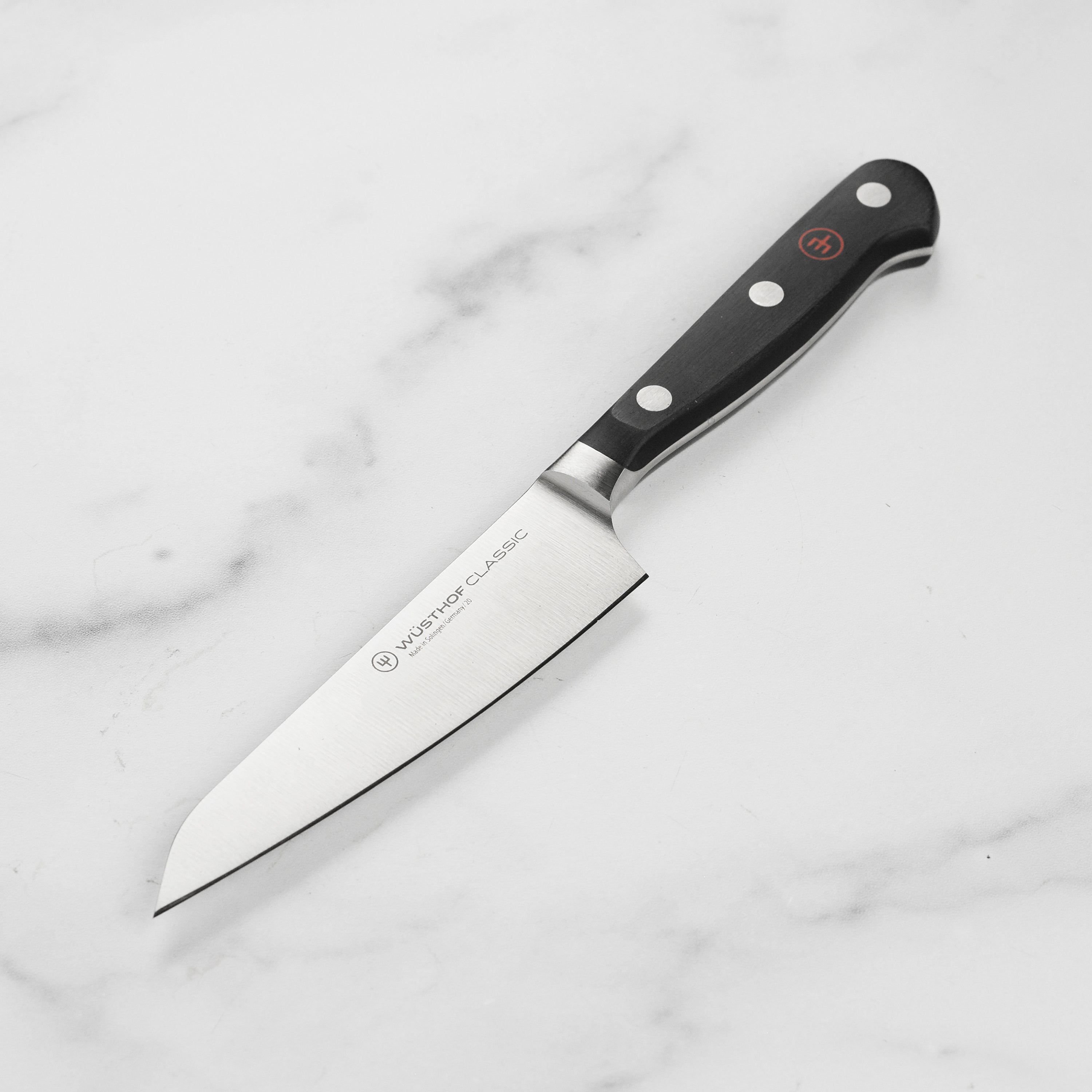 Wusthof Classic 4.5-Inch Asian Utility Knife with a sharp blade and ergonomic grip.