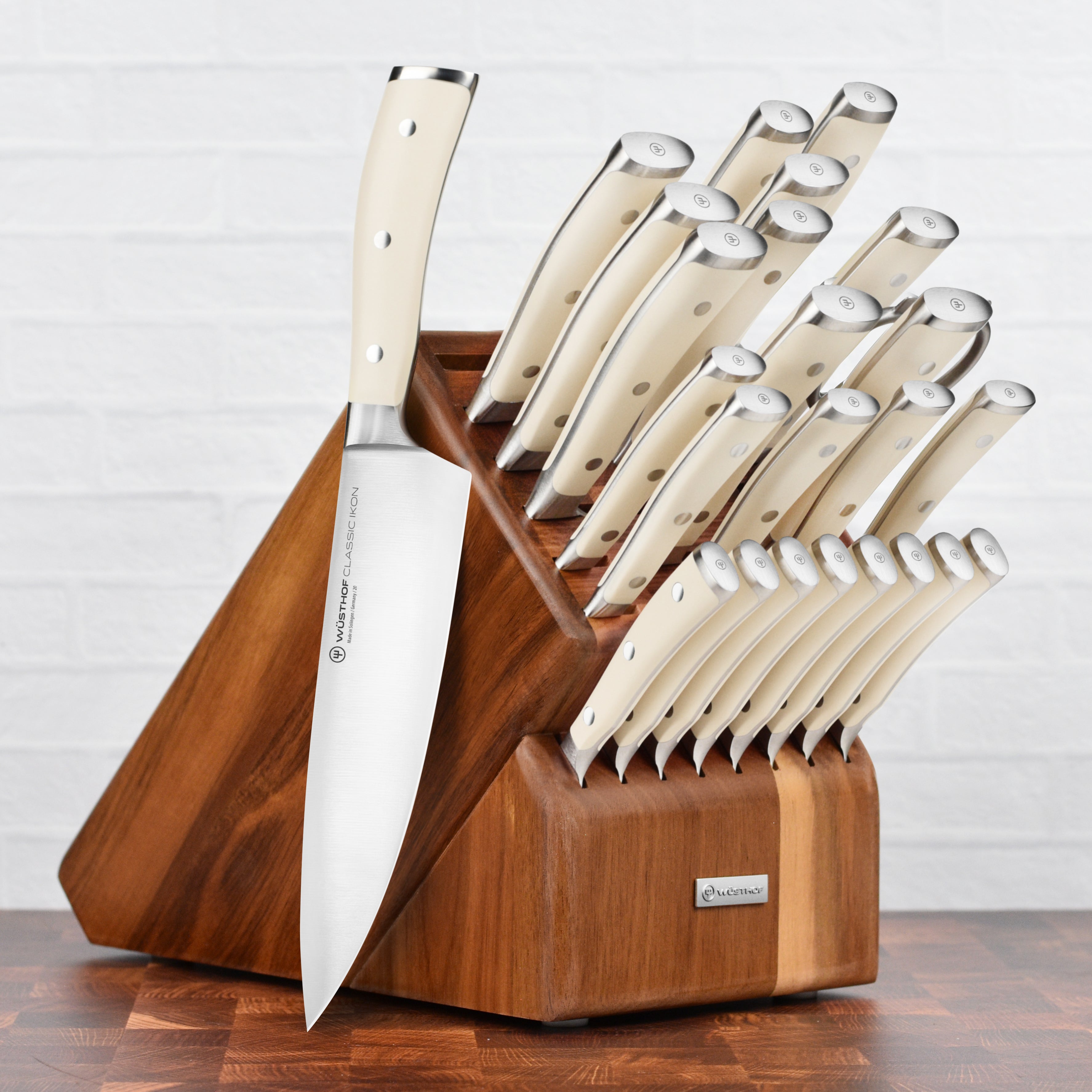 Close-up of Wusthof Classic Ikon knife set showing sharp blades and handles.