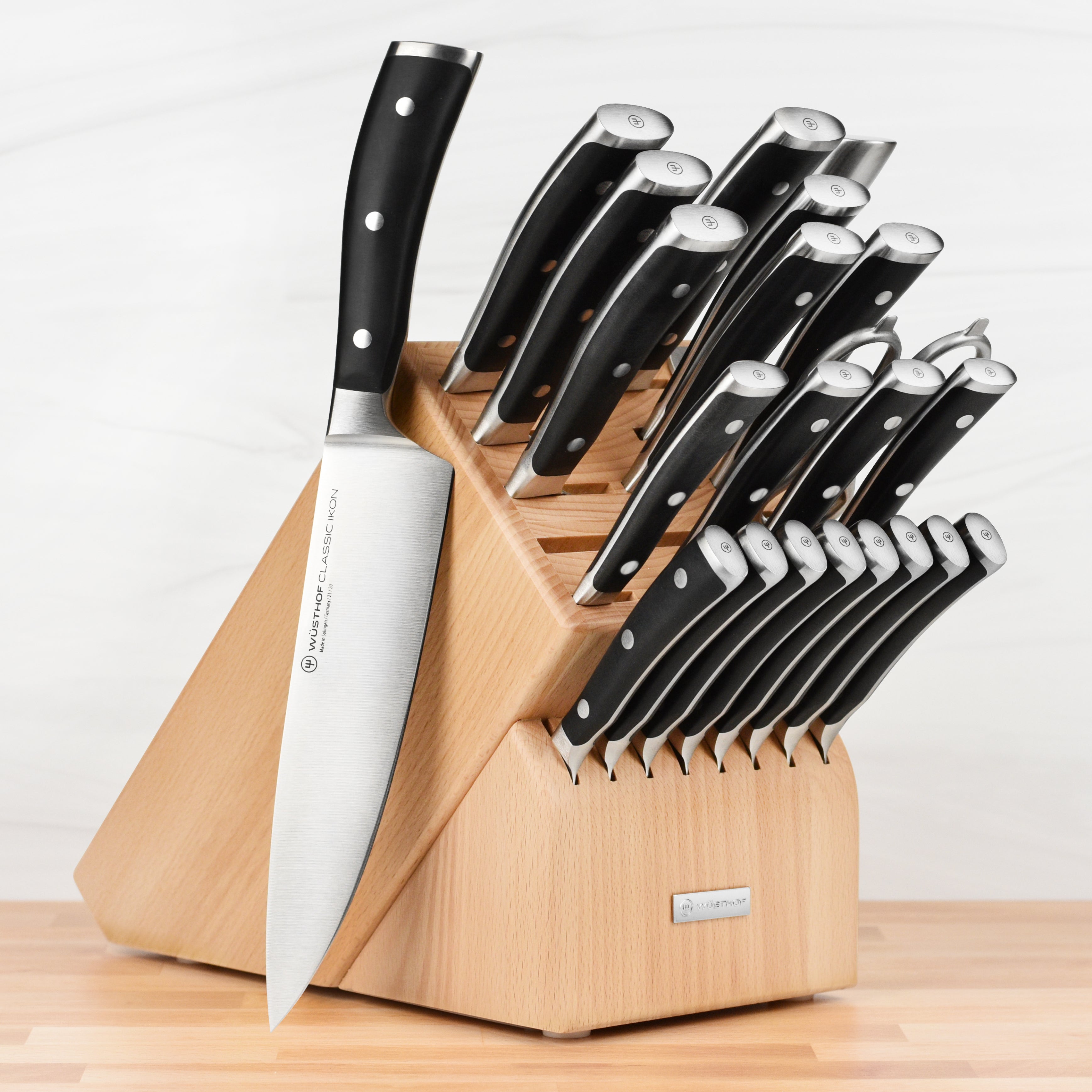 Wusthof Classic Ikon knife set displayed in a modern kitchen, showcasing its elegant design and craftsmanship.