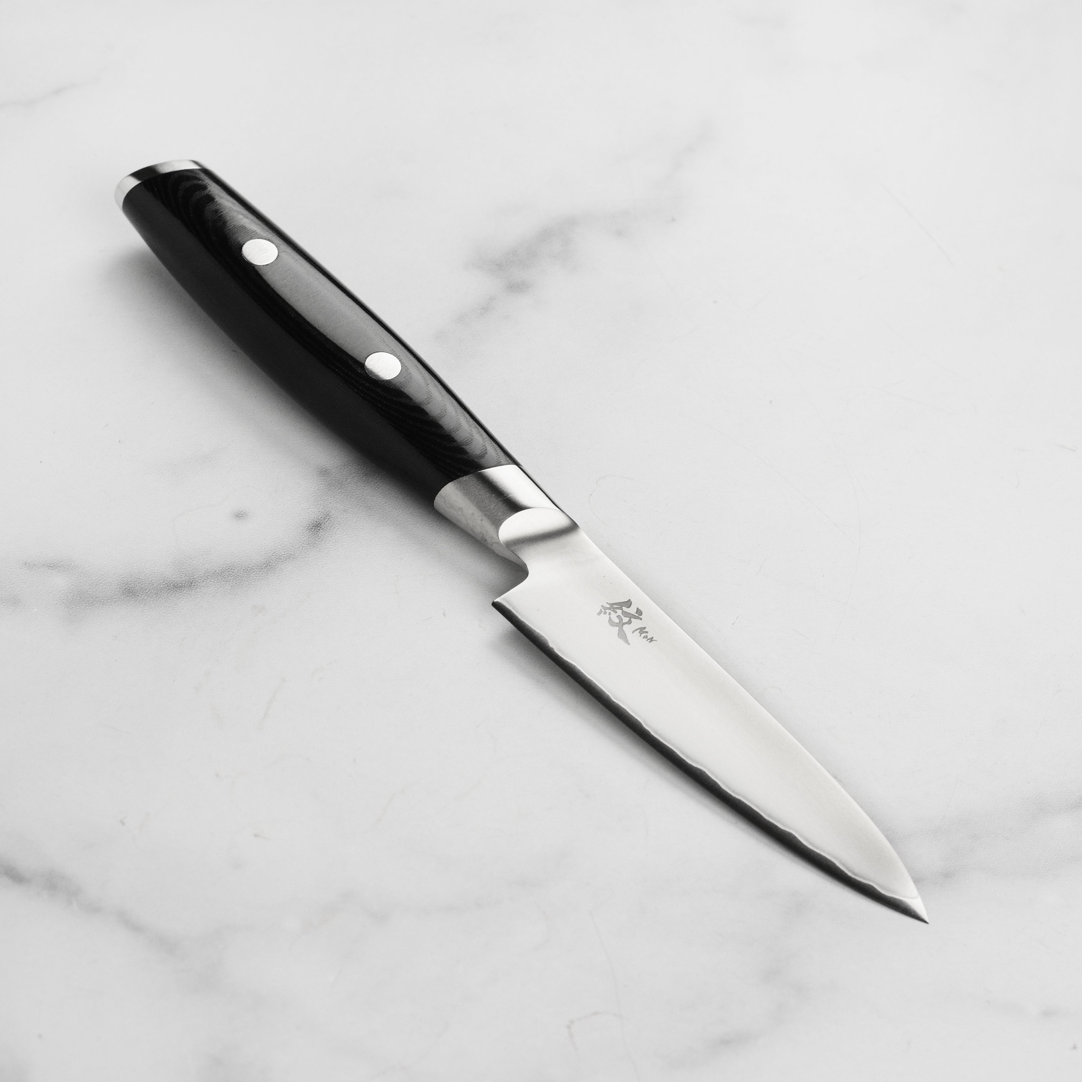 Yaxell Mon 4-inch Japanese paring knife with detailed blade view