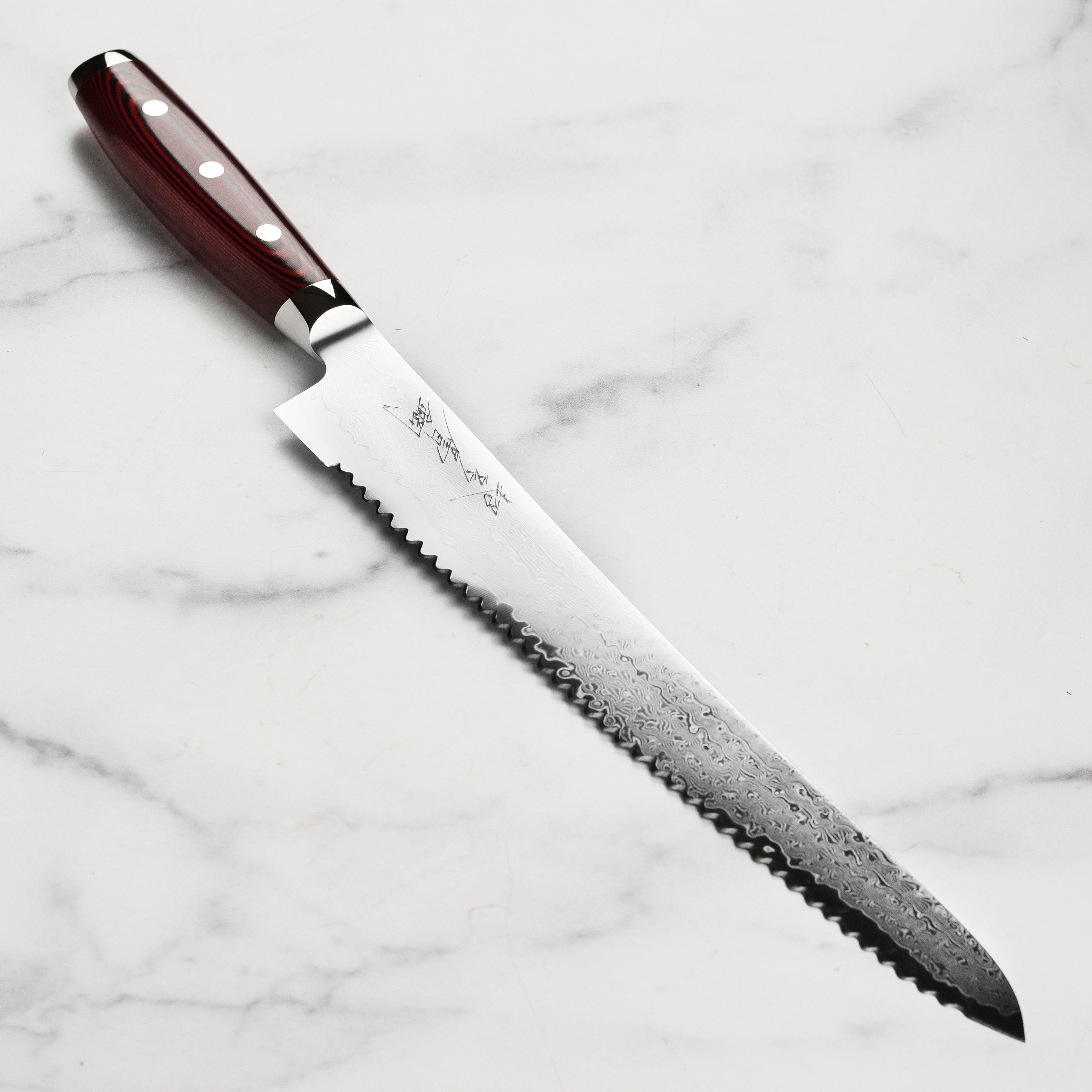 Yaxell Super Gou SG2 Premium Slicing Knife showcasing its elegant blade design