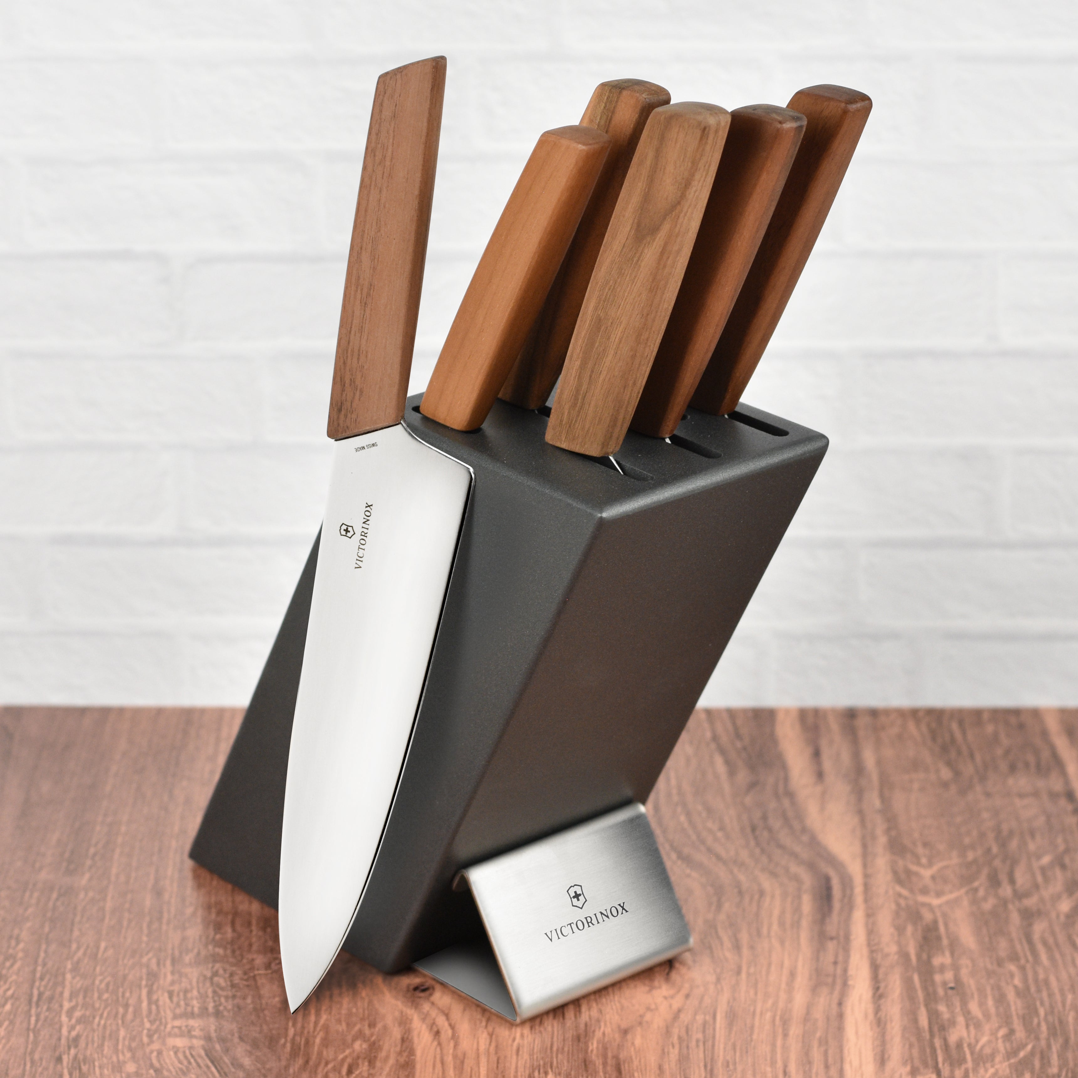 Victorinox Swiss Modern knife set in a wooden block showcasing the sleek design and high-carbon stainless steel blades.