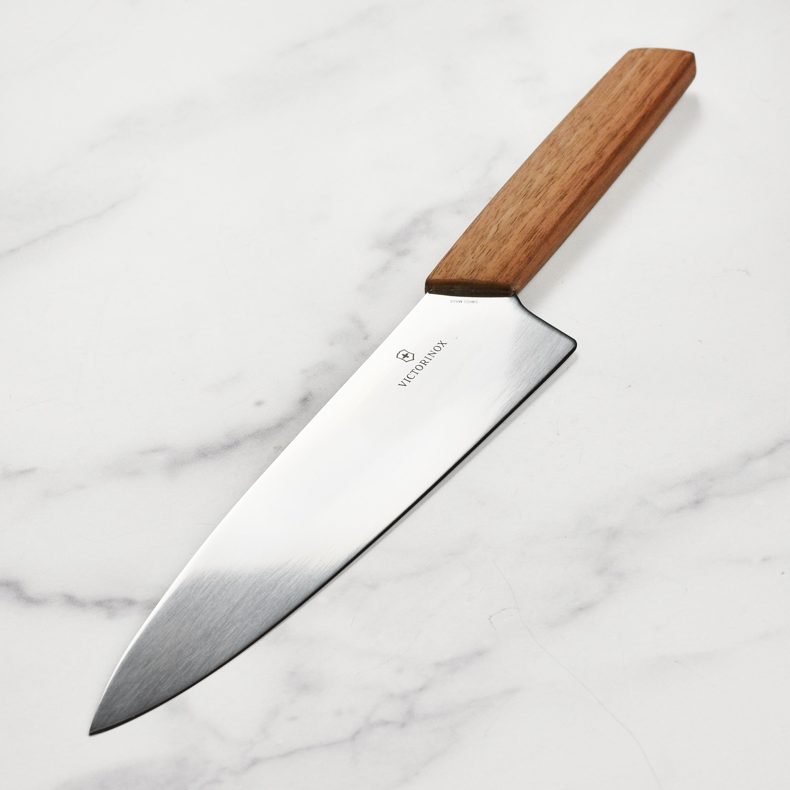 Victorinox Swiss Modern Wood chef's knife with wooden handle and sharp blade for kitchen prep
