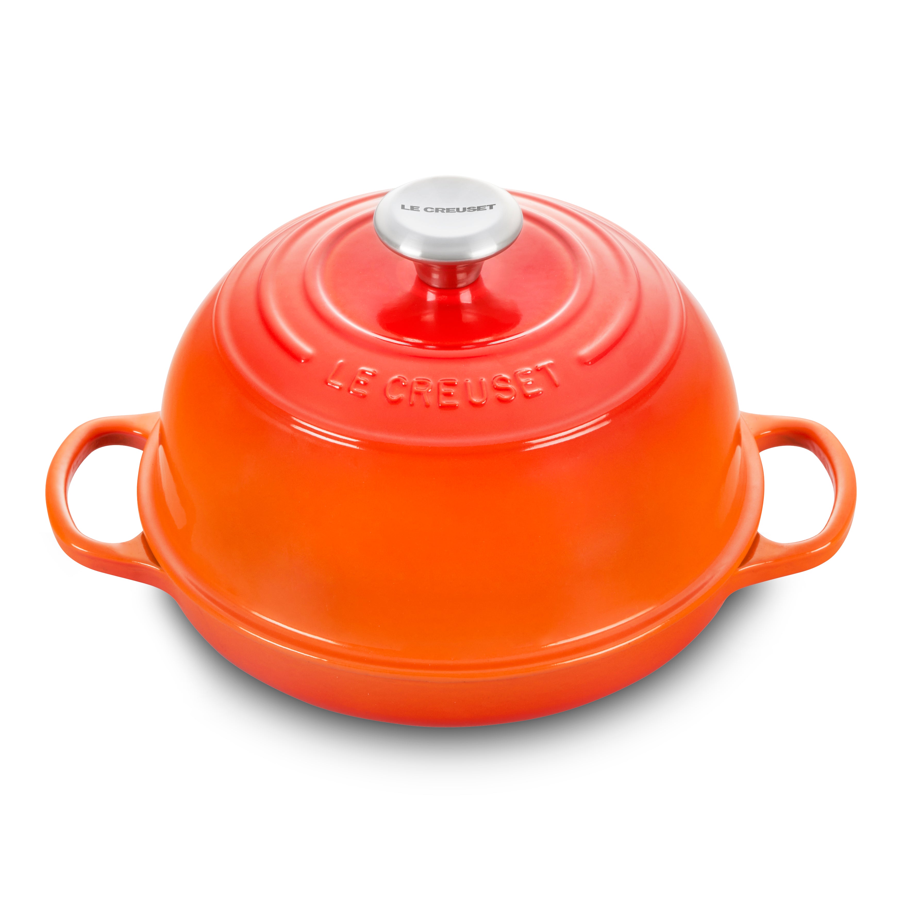 Top view of Le Creuset bread oven showcasing domed lid and ergonomic knob