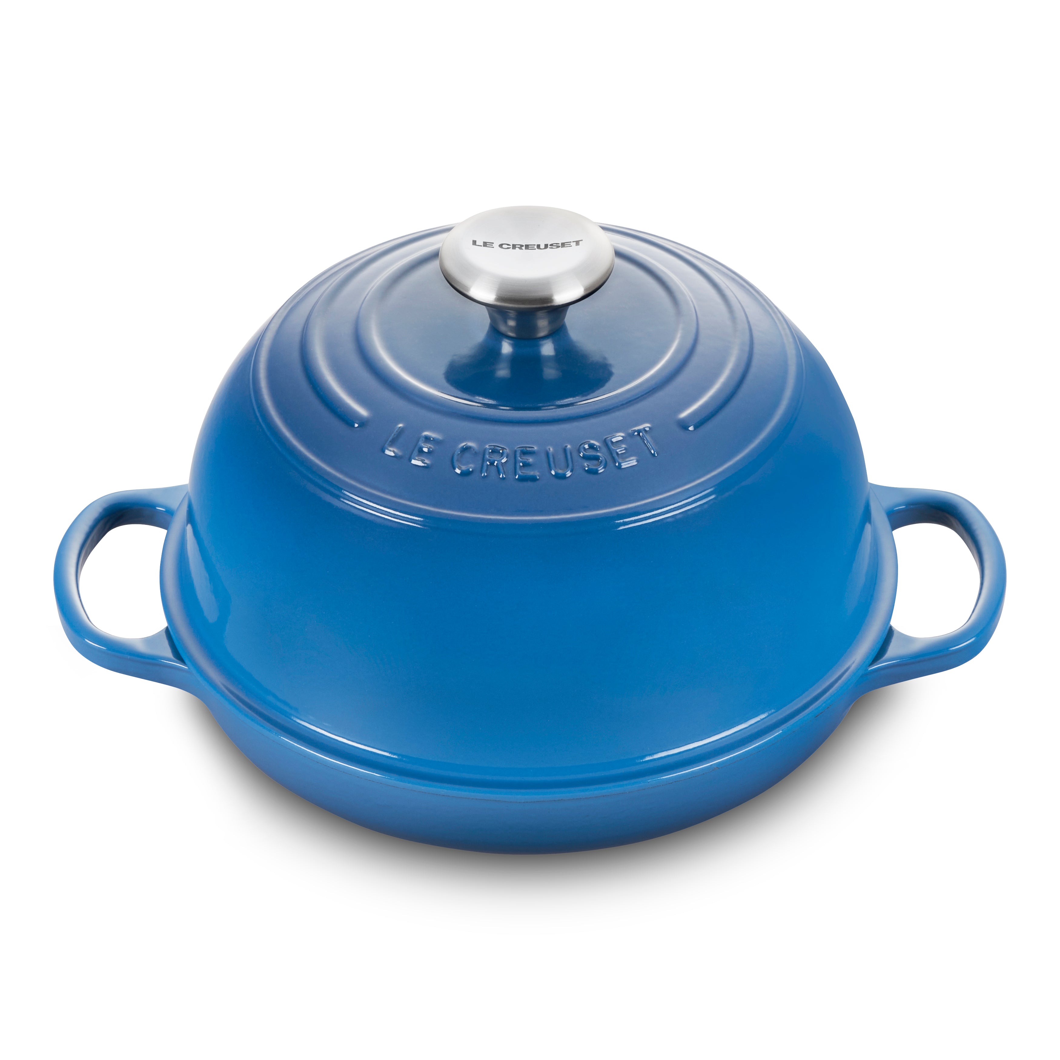 Le Creuset cast iron bread oven with lid open showing interior for baking bread