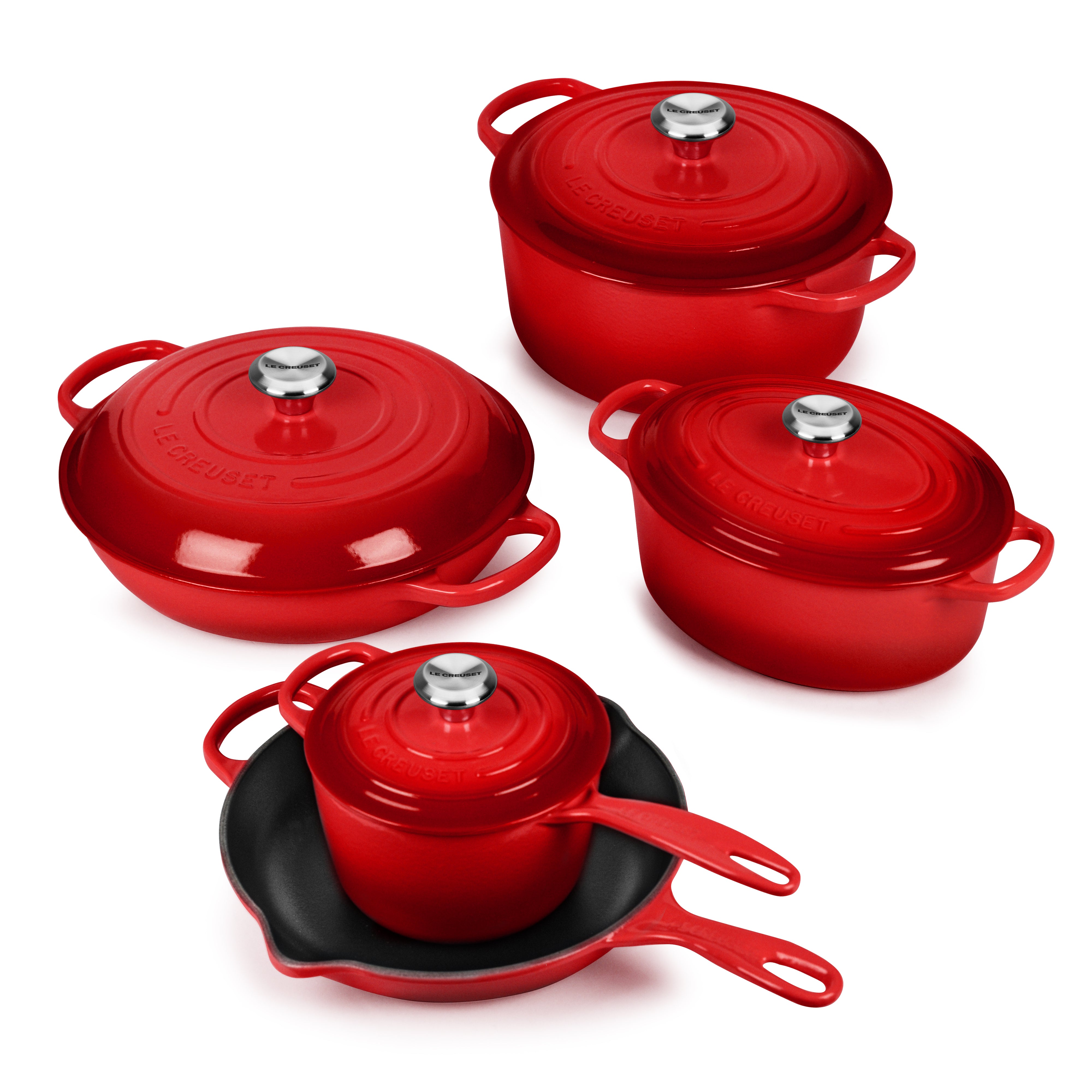 Le Creuset 9-Piece Signature Cast Iron Cookware Set showcasing vibrant colors and ergonomic design.