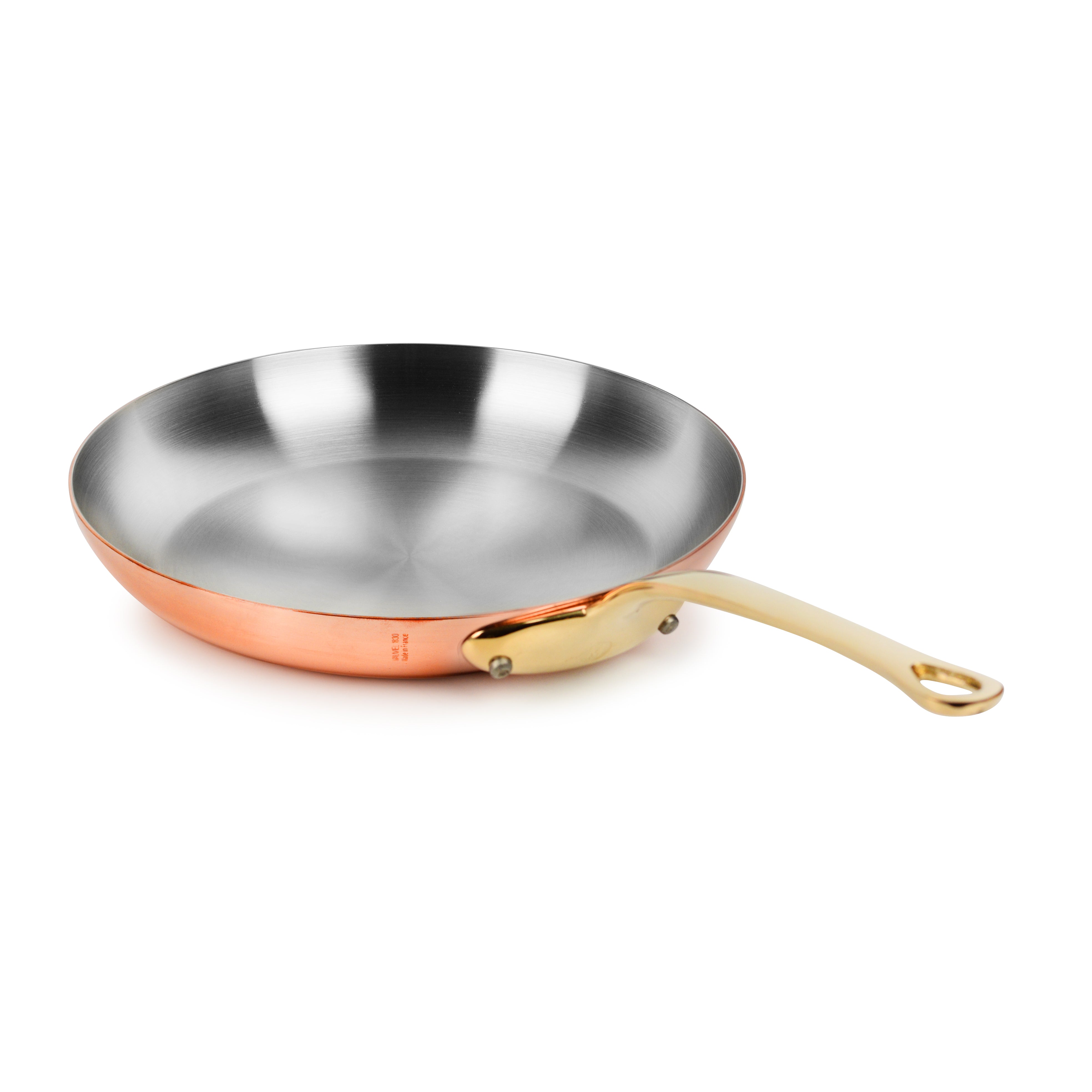 Mauviel copper frying pan showcasing its copper finish and bronze handle from a side angle.