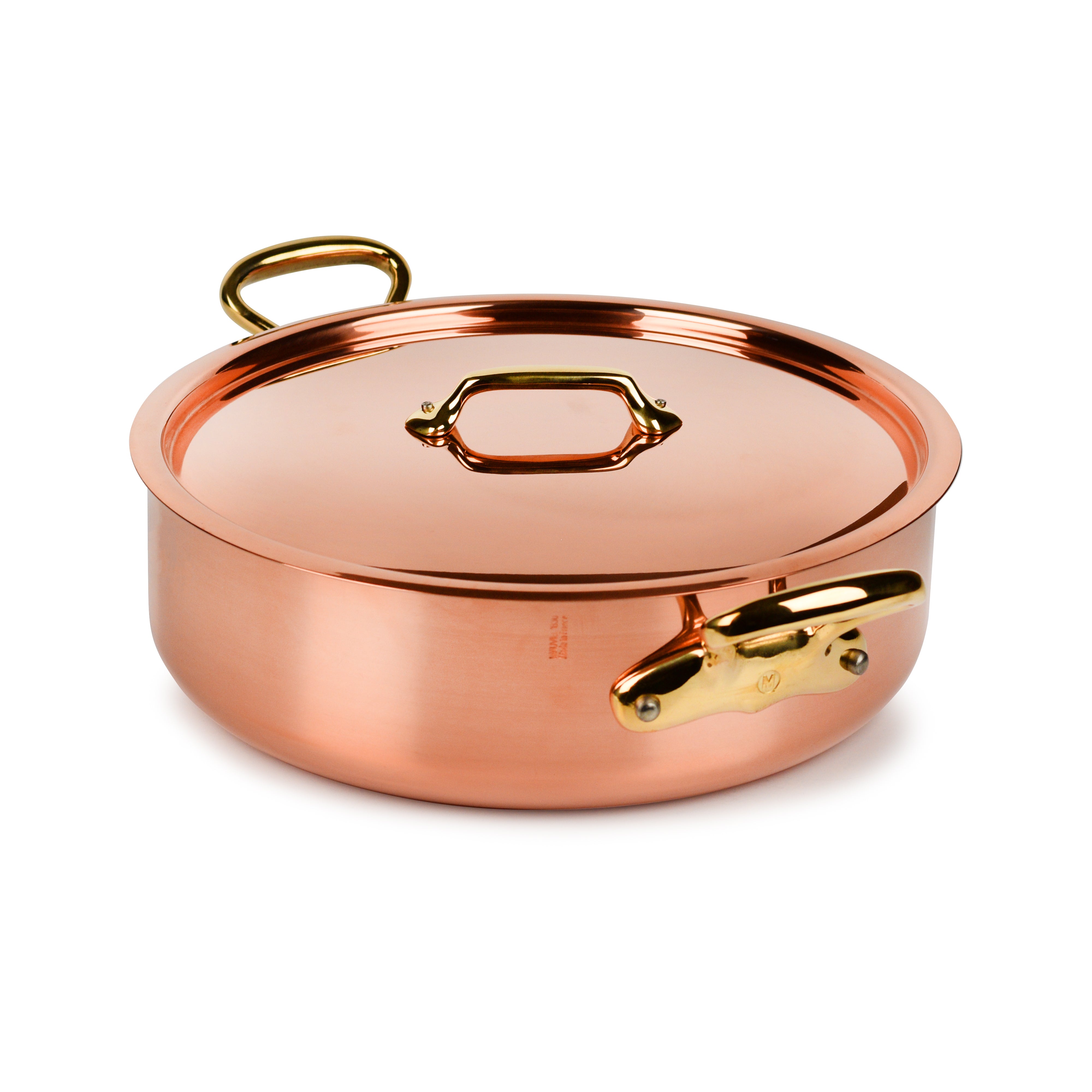 Mauviel copper rondeau showcasing the bronze handle and stainless steel rivets