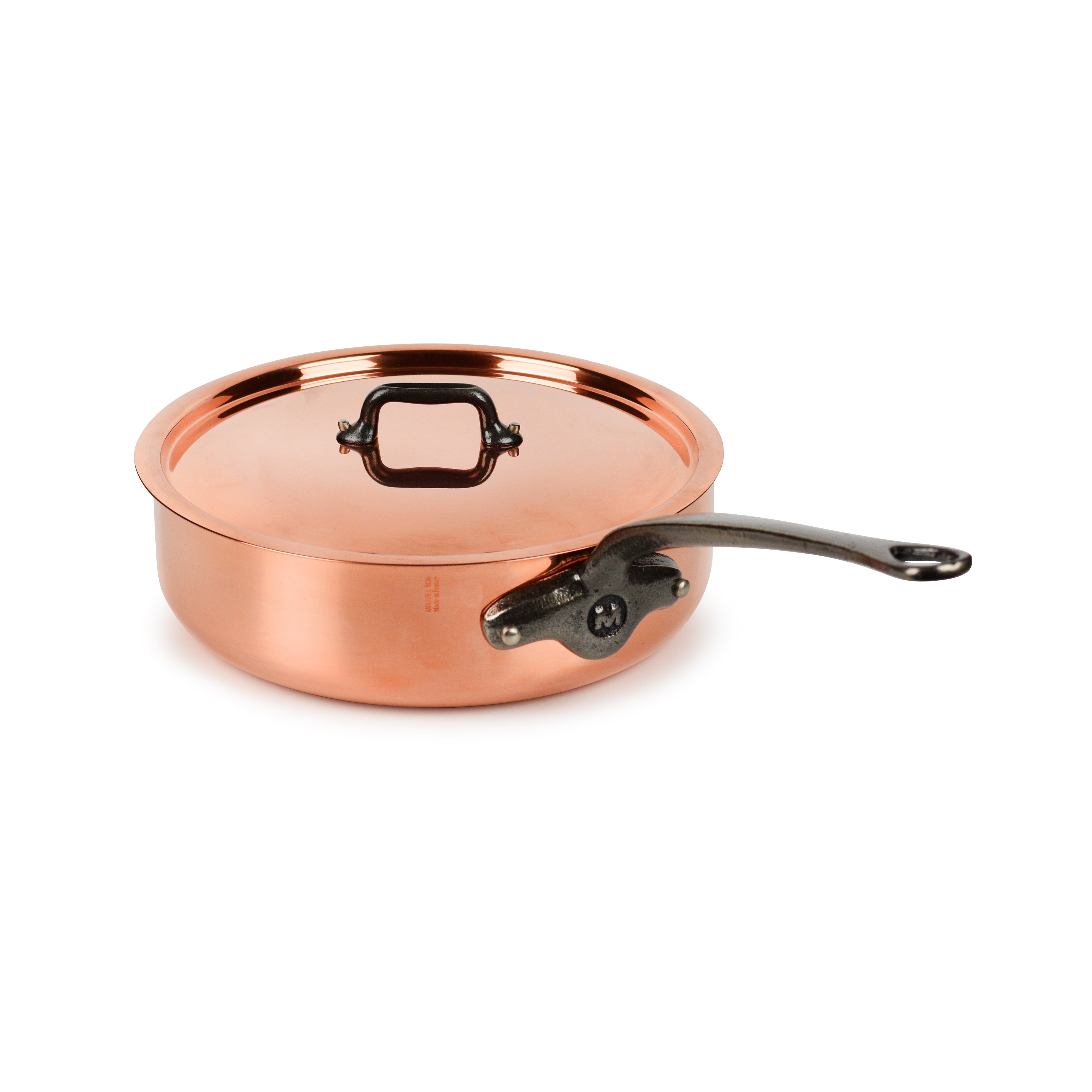 Close-up of Mauviel M200Ci copper saute pan with handle and lid for professional cooking