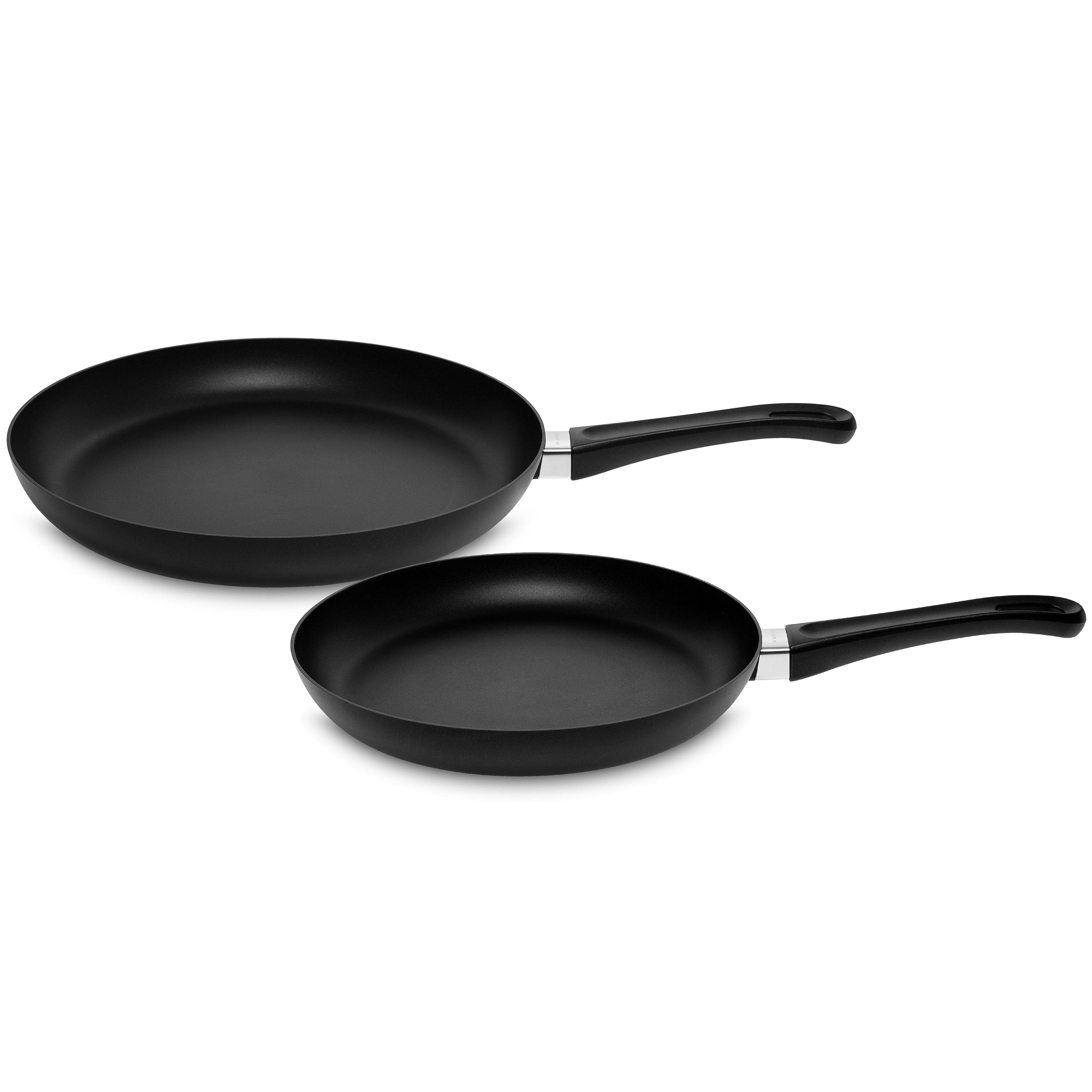 Close-up of Scanpan Classic nonstick fry pan set with shiny coating and ergonomic handle