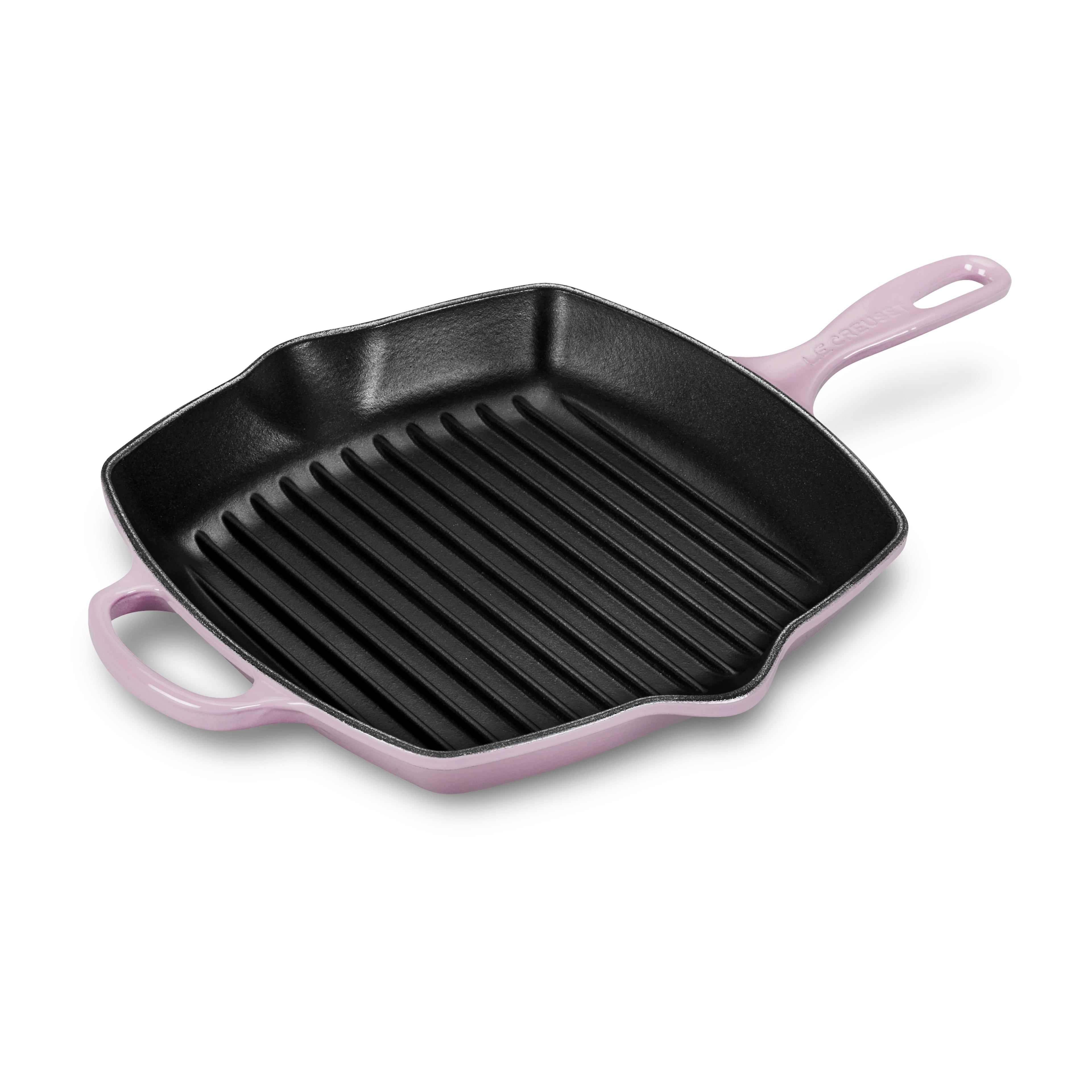 Le Creuset cast iron grill pan with high ridges for grilling and searing.