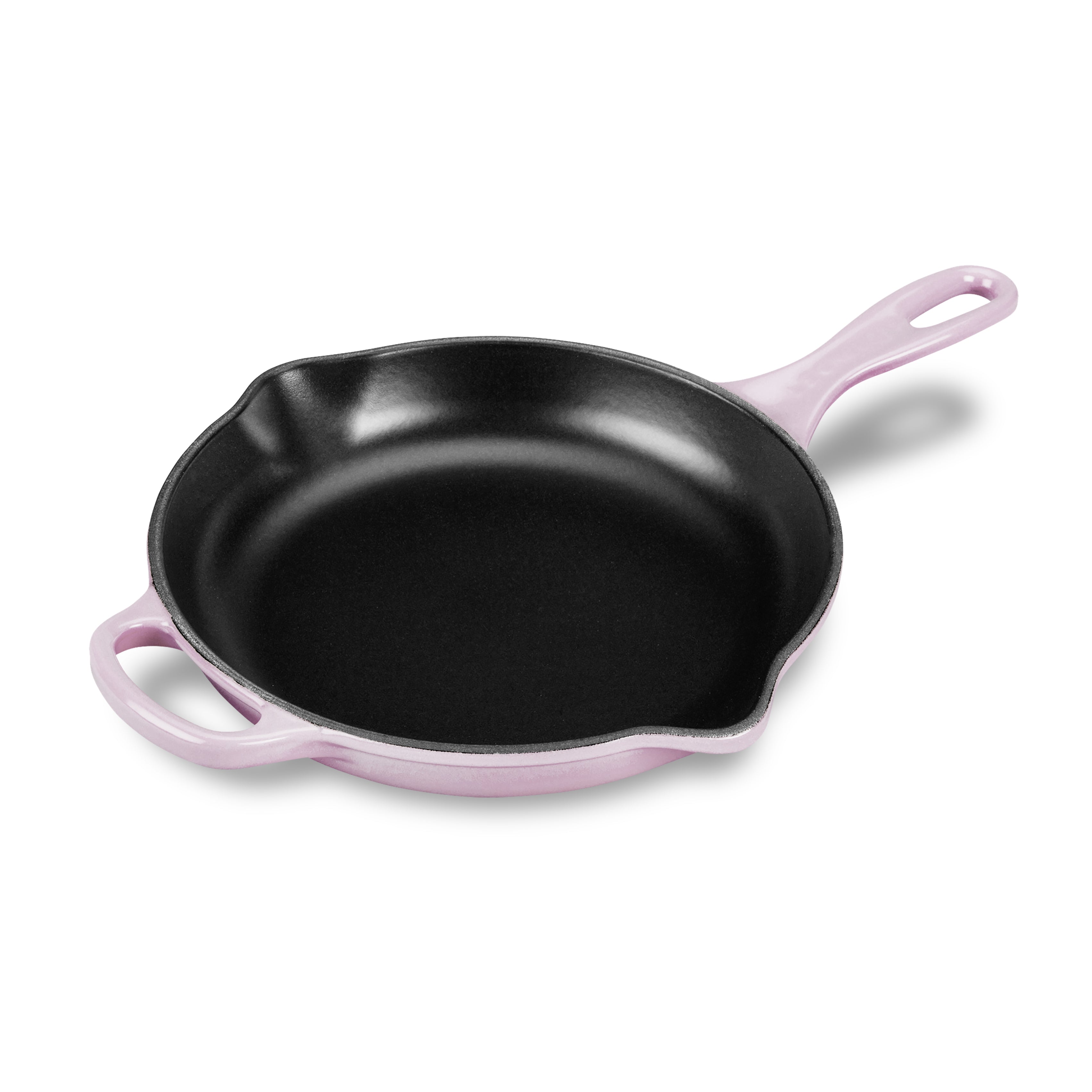 Close-up view of Le Creuset enamelled cast iron skillet showcasing the handle.