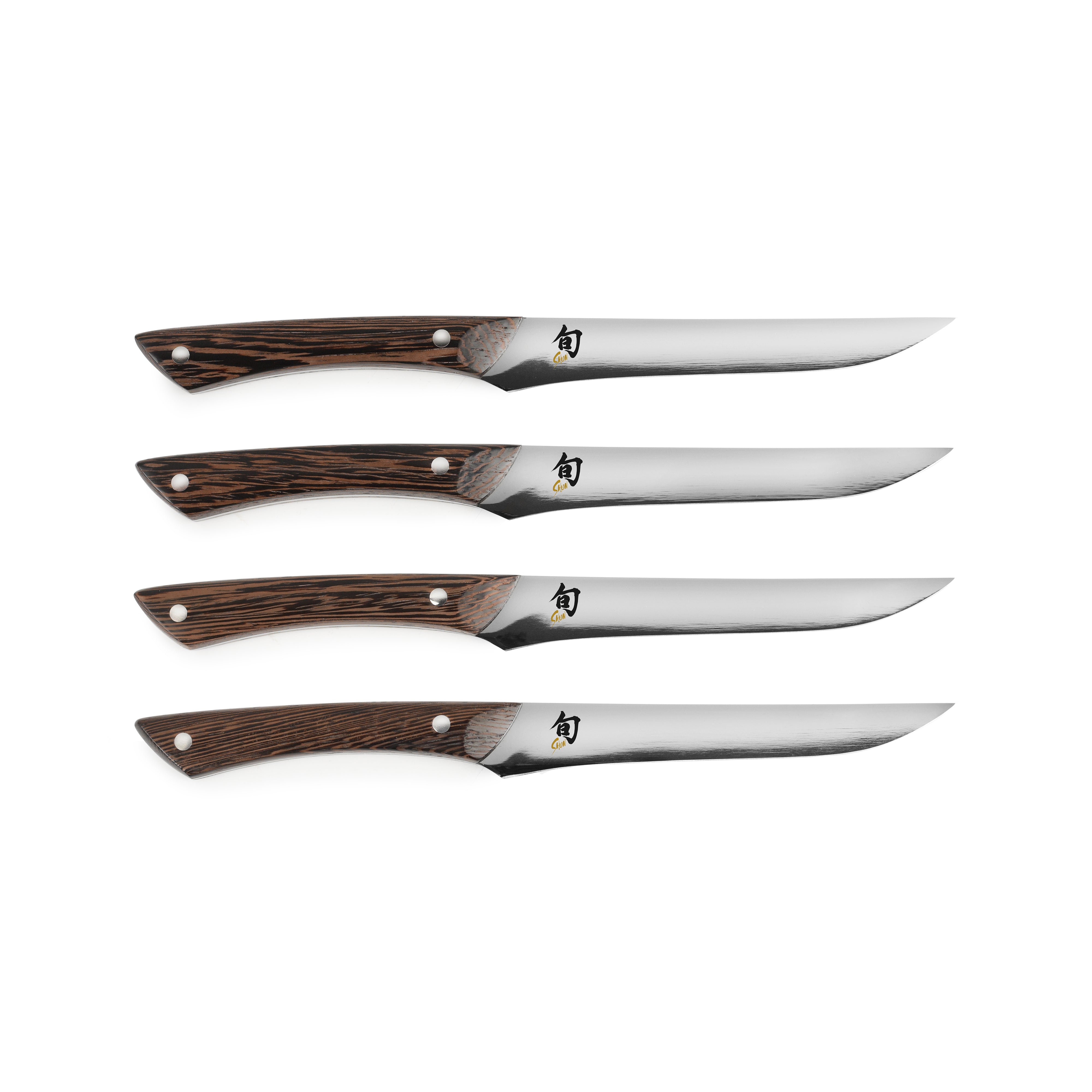 Close-up of the high-carbon blade of the premium Japanese steak knife set, highlighting its sharp edge.